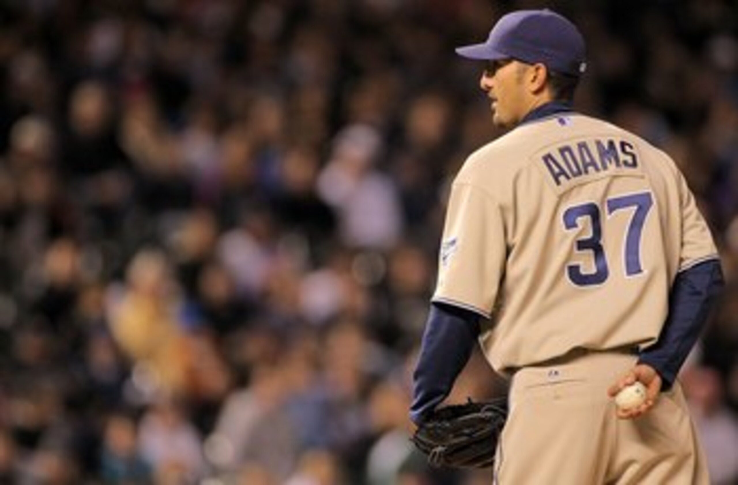 DENVER - APRIL 10:  Relief pitcher Mike Adams #37 of the San Diego Padres delivers against the Colorado Rockies during MLB action at Coors Field on April 10, 2010 in Denver, Colorado. The Padres defeated the Rockies 5-4 in 14 innings.  (Photo by Doug Pens
