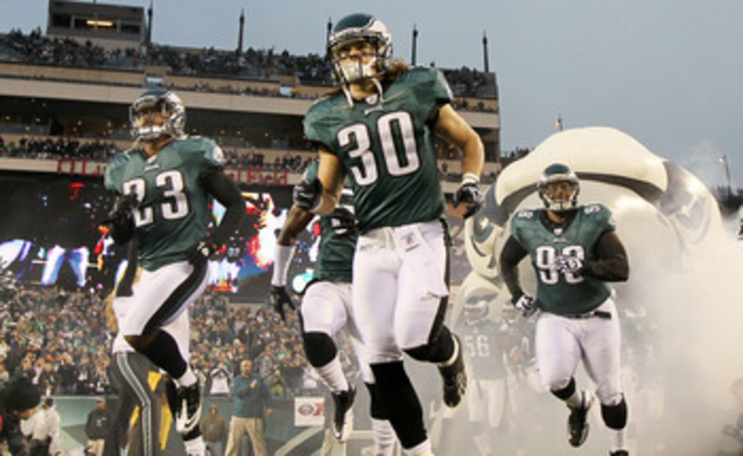 PHILADELPHIA, PA - JANUARY 02:  Dimitri Patterson #23, Colt Anderson #30, and Mike Patterson #98 of the Philadelphia Eagles take the field to play against the Dallas Cowboys on January 2, 2011 at Lincoln Financial Field in Philadelphia, Pennsylvania.  (Ph