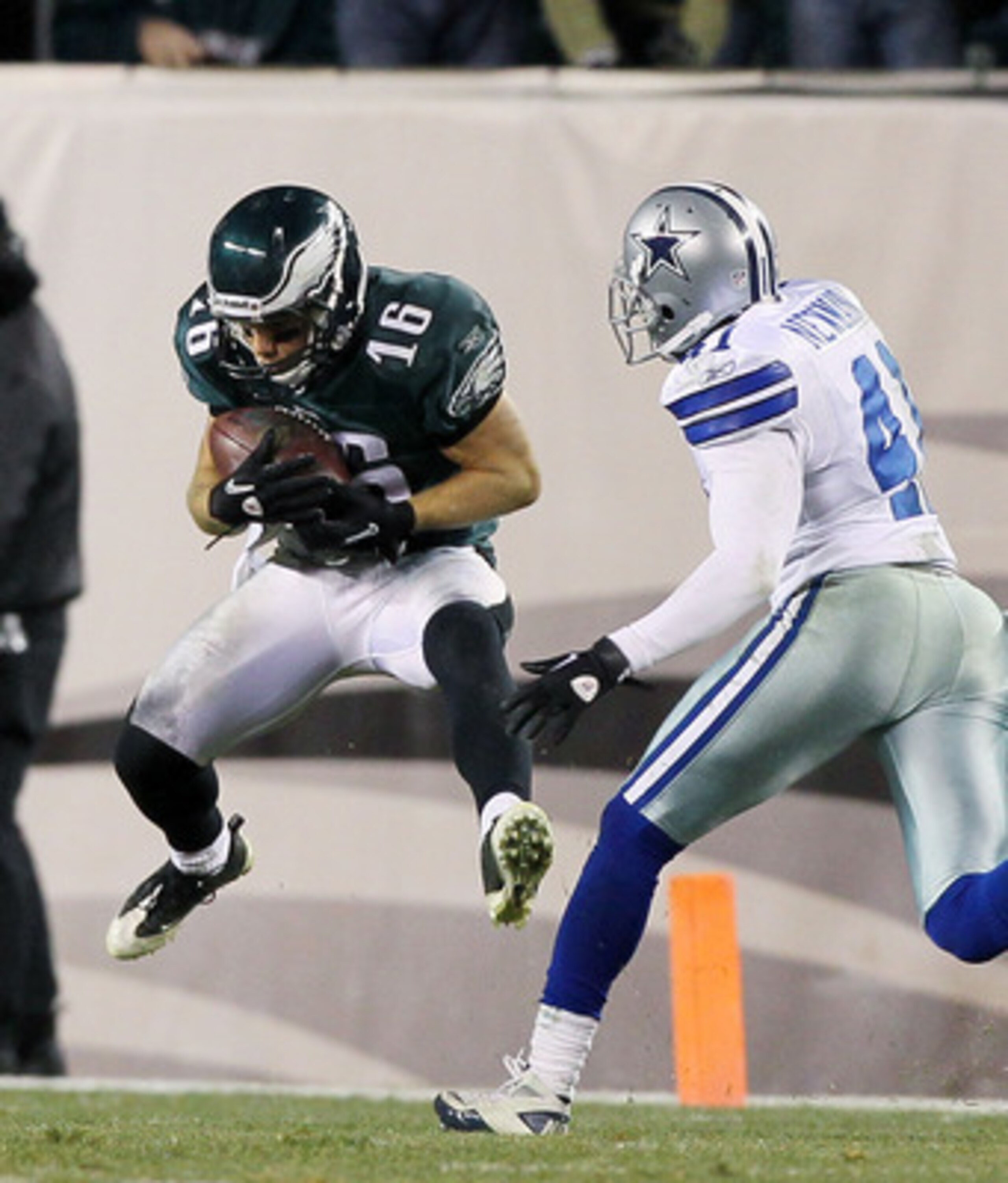 PHILADELPHIA, PA - JANUARY 02:  Chad Hall #16 of the Philadelphia Eagles hauls in a long reception against Terence Newman #41 of the Dallas Cowboys on January 2, 2011 at Lincoln Financial Field in Philadelphia, Pennsylvania. The Cowboys defeated the Eagle