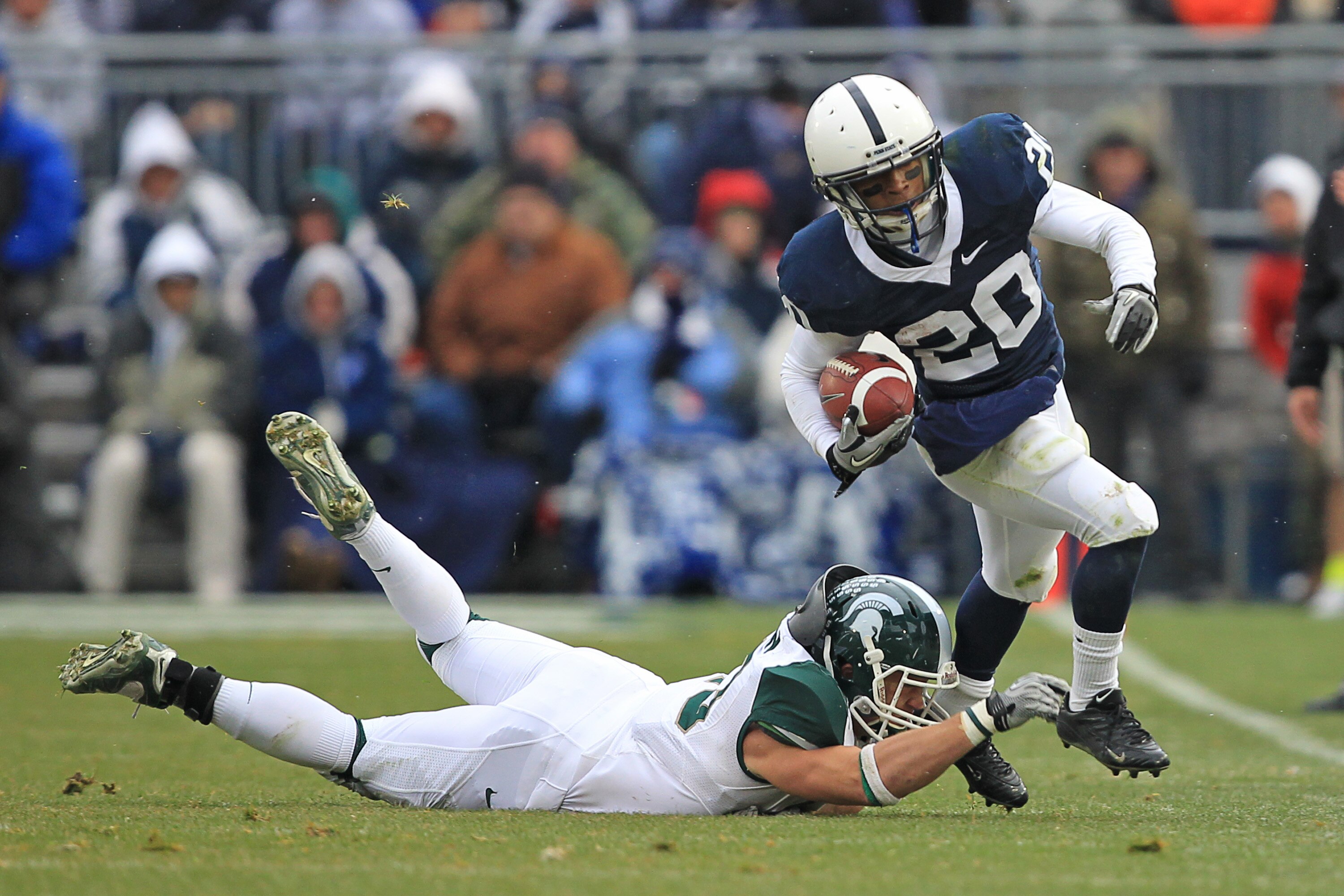 STATE COLLEGE, PA - NOVEMBER 27: Wide receiver Devon Smith #20 of the Penn State Nittany Lions runs with the ball during a game against the Michigan State Spartans on November 27, 2010 at Beaver Stadium in State College, Pennsylvania. The Spartans won 28-