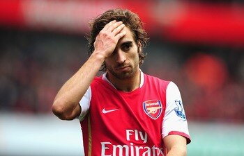 LONDON - APRIL 05:  Mathieu Flamini of Arsenal is dejected after the Barclays Premier League match between Arsenal and Liverpool held at the Emirates Stadium on April 5, 2008 in London, England.  (Photo by Shaun Botterill/Getty Images)