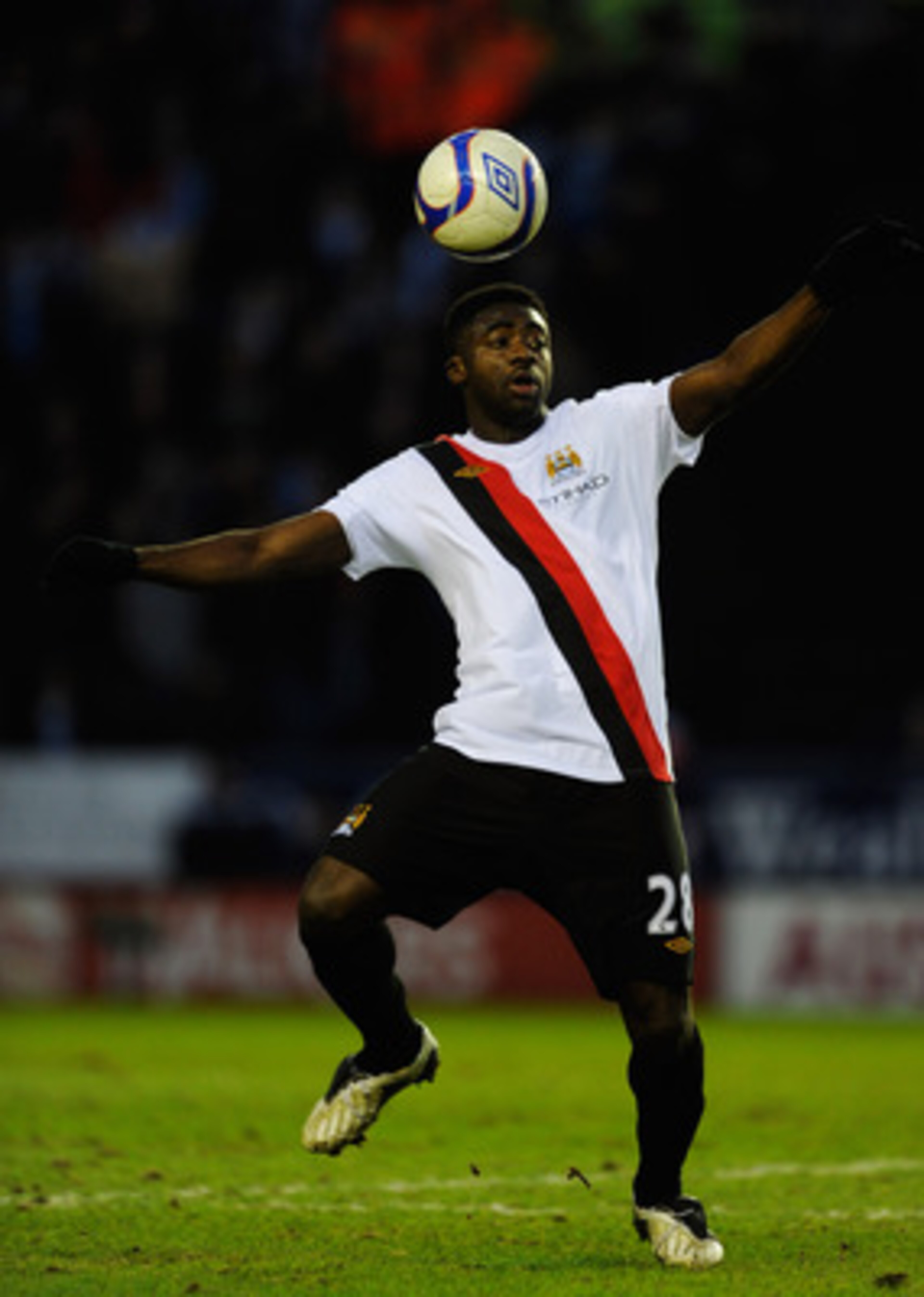 LEICESTER, UNITED KINGDOM - JANUARY 09:  Kolo Toure of Manchester City controls the ball during the FA Cup sponsored by E.ON 3rd Round match between between Leicester City and Manchester City at Walkers Stadium on January 9, 2011 in Leicester, England.  (