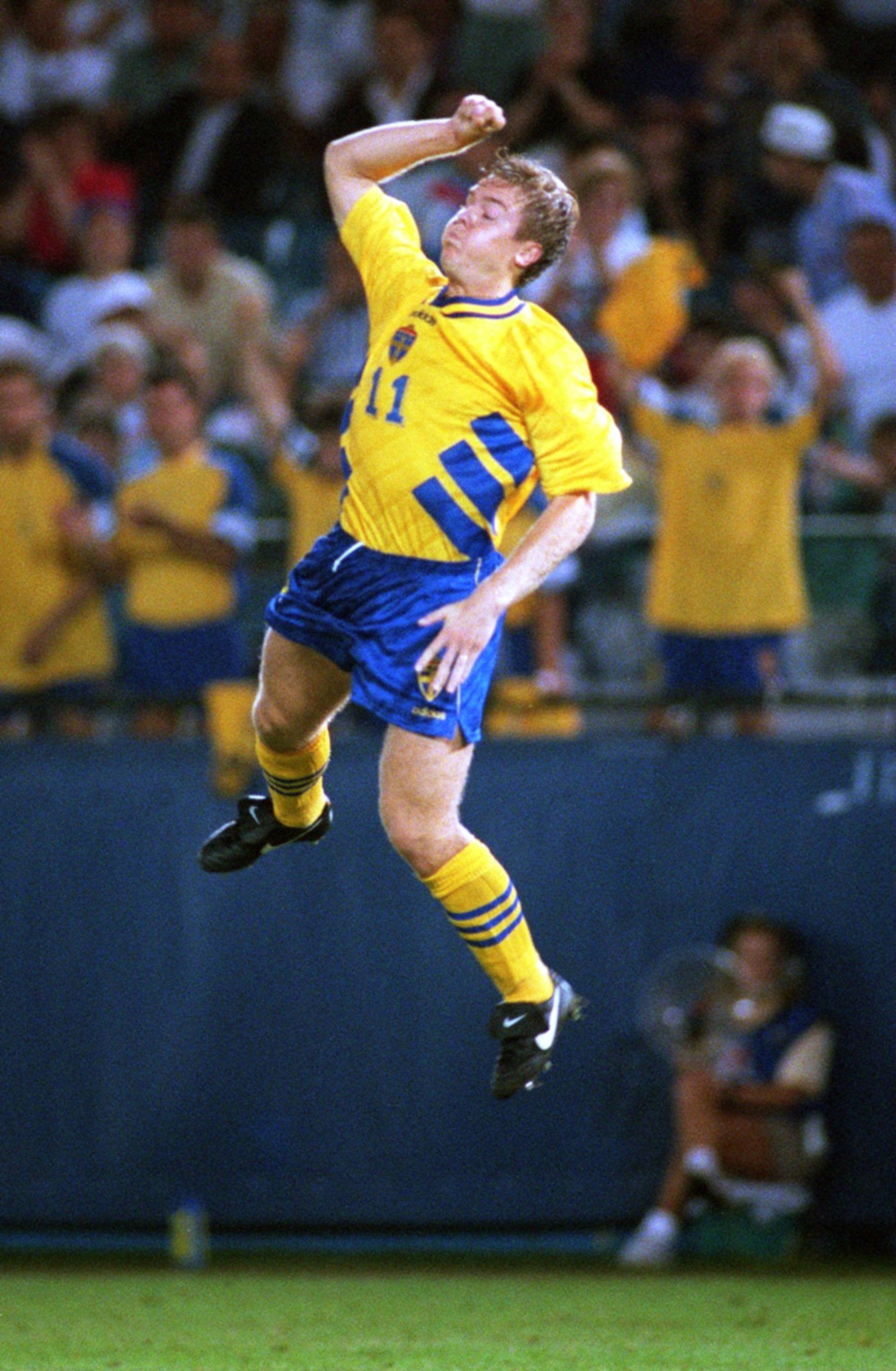 24 JUN 1994: THOMAS BROLIN OF SWEDEN LEAPS FOR JOY AFTER SCORING AGAINST RUSSIA DURING THE 1994 WORLD CUP AT THE SILVERDOME IN PONTIAC, MICHIGAN. THE FIRST-HALF GOAL TIED THE GAME AT 1-1. Mandatory Credit: JONATHAN DANIEL/ALLSPORT 24 JUN 1994: THOMAS BROLIN OF SWEDEN LEAPS FOR JOY AFTER SCORING AGAINST RUSSIA DURING THE 1994 WORLD CUP AT THE SILVERDOME IN PONTIAC, MICHIGAN. THE FIRST-HALF GOAL TIED THE GAME AT 1-1. Mandatory Credit: JONATHAN DANIEL/ALLSPORT