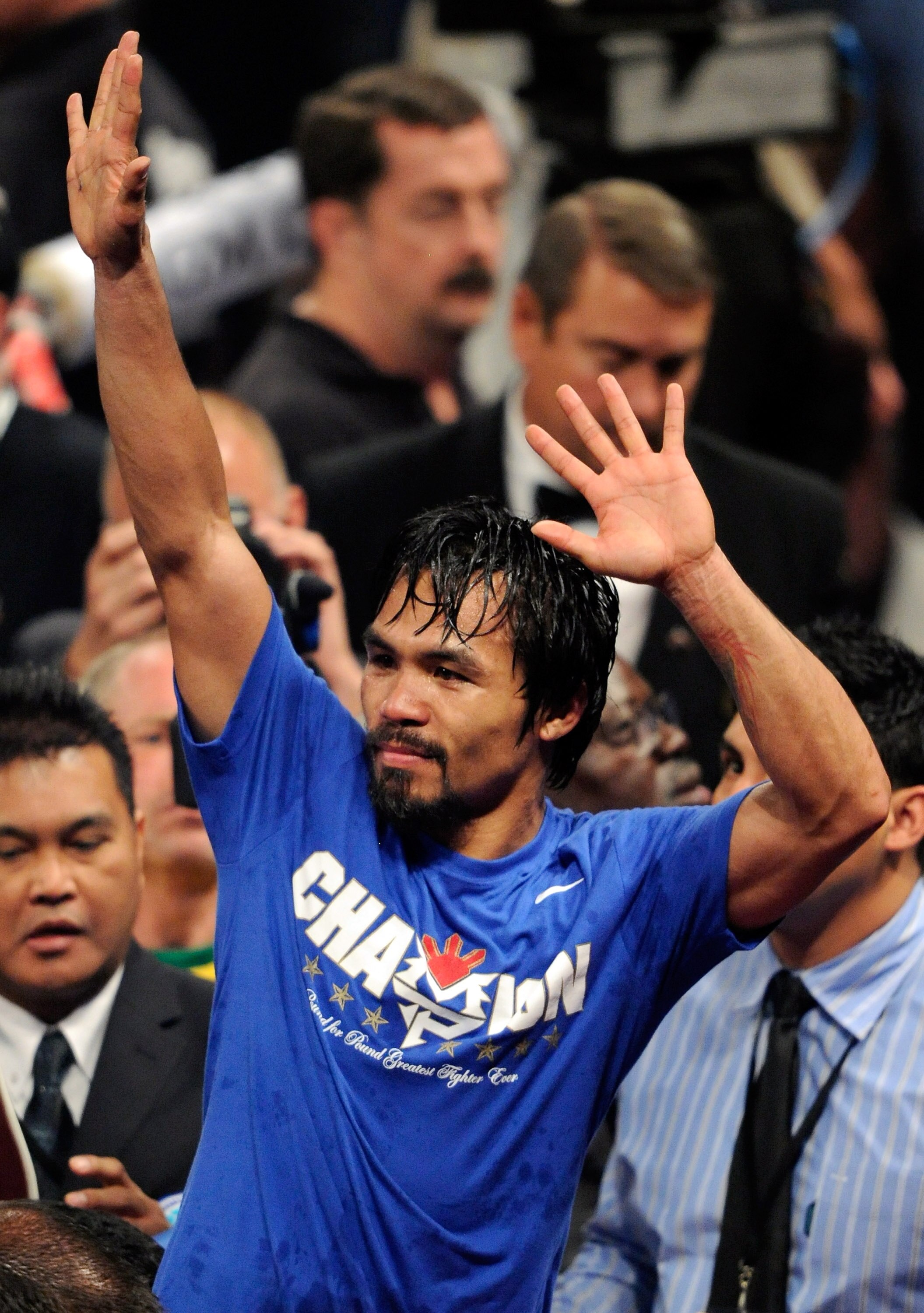 LAS VEGAS, NV - MAY 07:  Boxer Manny Pacquiao reacts at the end of his WBO welterweight title fight against Shane Mosley at the MGM Grand Garden Arena May 7, 2011 in Las Vegas, Nevada. Pacquiao retained his title by unanimous decision.  (Photo by Ethan Mi