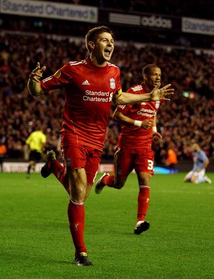LIVERPOOL, ENGLAND - NOVEMBER 04:  Steven Gerrard of Liverpool celebrates scoring his team's third goal and his hat trick during the UEFA Europa League Group K match beteween Liverpool and SSC Napoli at Anfield on November 4, 2010 in Liverpool, England.  