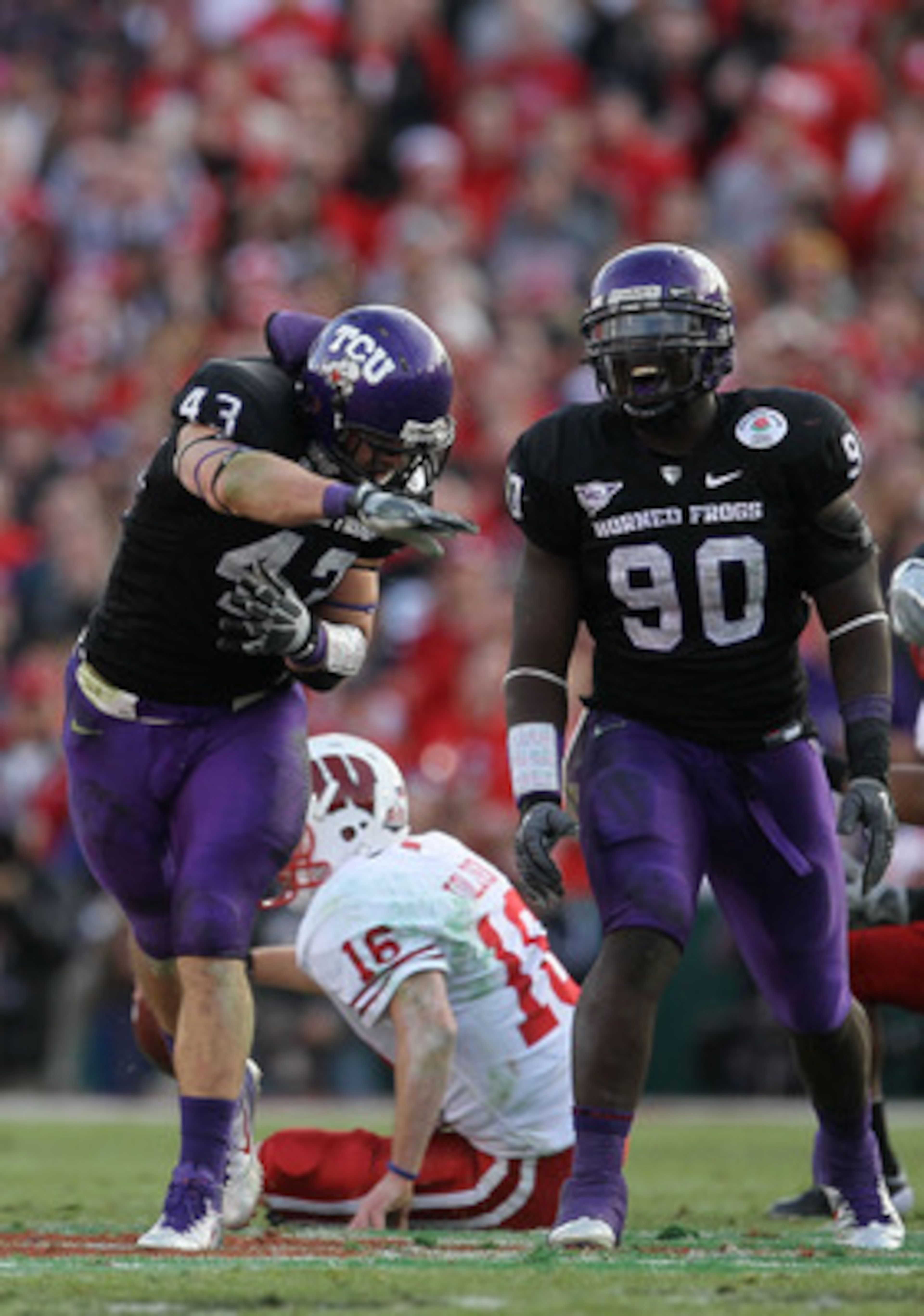 PASADENA, CA - JANUARY 01: Linebacker Tank Carder #43 of the TCU Horned Frogs celebrates after a sack of quarterback Scott Tolzien #16 of the Wisconsin Badgers during the 97th Rose Bowl game on January 1, 2011 in Pasadena, California. (Photo by Stephen PASADENA, CA - JANUARY 01: Linebacker Tank Carder #43 of the TCU Horned Frogs celebrates after a sack of quarterback Scott Tolzien #16 of the Wisconsin Badgers during the 97th Rose Bowl game on January 1, 2011 in Pasadena, California. (Photo by Stephen