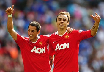 LONDON, ENGLAND - AUGUST 08: Dimitar Berbatov of Manchester United (R) celebrates with Javier Hernandez as he scores their third goal during the FA Community Shield match between Chelsea and Manchester United at Wembley Stadium on August 8, 2010 in Londo LONDON, ENGLAND - AUGUST 08: Dimitar Berbatov of Manchester United (R) celebrates with Javier Hernandez as he scores their third goal during the FA Community Shield match between Chelsea and Manchester United at Wembley Stadium on August 8, 2010 in Londo