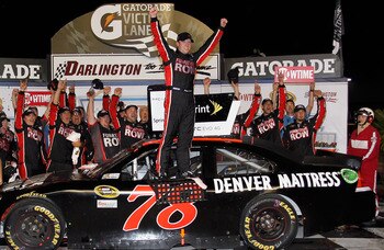 DARLINGTON, SC - MAY 07: Regan Smith, driver of the #78 Furniture Row Companies Chevrolet, celebrates in Victory Lane after winning the NASCAR Sprint Cup Series SHOWTIME Southern 500 at Darlington Raceway on May 7, 2011 in Darlington, South Carolina. (P DARLINGTON, SC - MAY 07: Regan Smith, driver of the #78 Furniture Row Companies Chevrolet, celebrates in Victory Lane after winning the NASCAR Sprint Cup Series SHOWTIME Southern 500 at Darlington Raceway on May 7, 2011 in Darlington, South Carolina. (P
