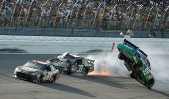 TALLADEGA, AL - APRIL 26: Carl Edwards, driver of the #99 Claritin Ford, goes airborne as Ryan Newman, driver of the #39 Steweart-Haas Racing Chevrolet suffers damage and Brad Keselowski, driver of the #09 Miccosukee Indian Gaming Chevrolet drives at the TALLADEGA, AL - APRIL 26: Carl Edwards, driver of the #99 Claritin Ford, goes airborne as Ryan Newman, driver of the #39 Steweart-Haas Racing Chevrolet suffers damage and Brad Keselowski, driver of the #09 Miccosukee Indian Gaming Chevrolet drives at the