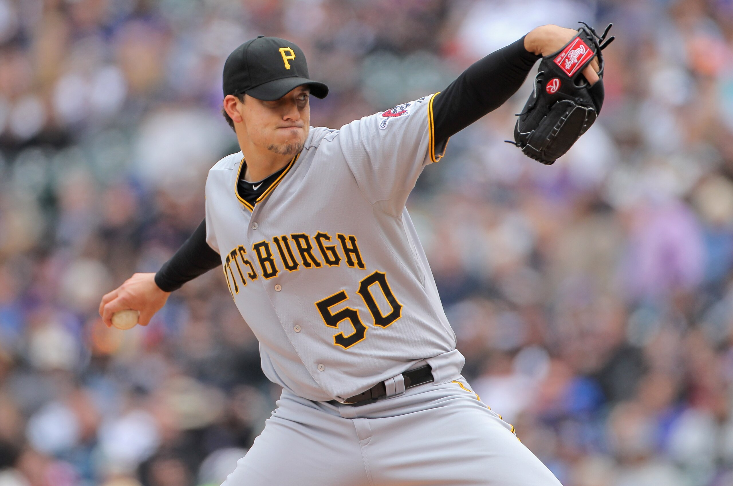 DENVER, CO - MAY 01:  Starting pitcher Charlie Morton #50 of the Pittsburgh Pirates delivers against the Colorado Rockies at Coors Field on May 1, 2011 in Denver, Colorado. Morton earned the win as the Pirates defeated the Rockies 8-4.  (Photo by Doug Pen