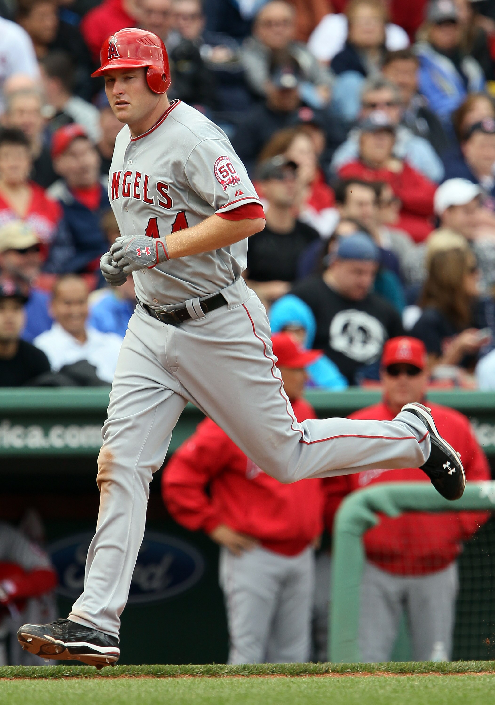 BOSTON, MA - MAY 05:  Mark Trumbo #44 of the Los Angeles Angels heads for home after he hit a two run homer against the Boston Red Sox on May 5, 2011 at Fenway Park in Boston, Massachusetts.  (Photo by Elsa/Getty Images)