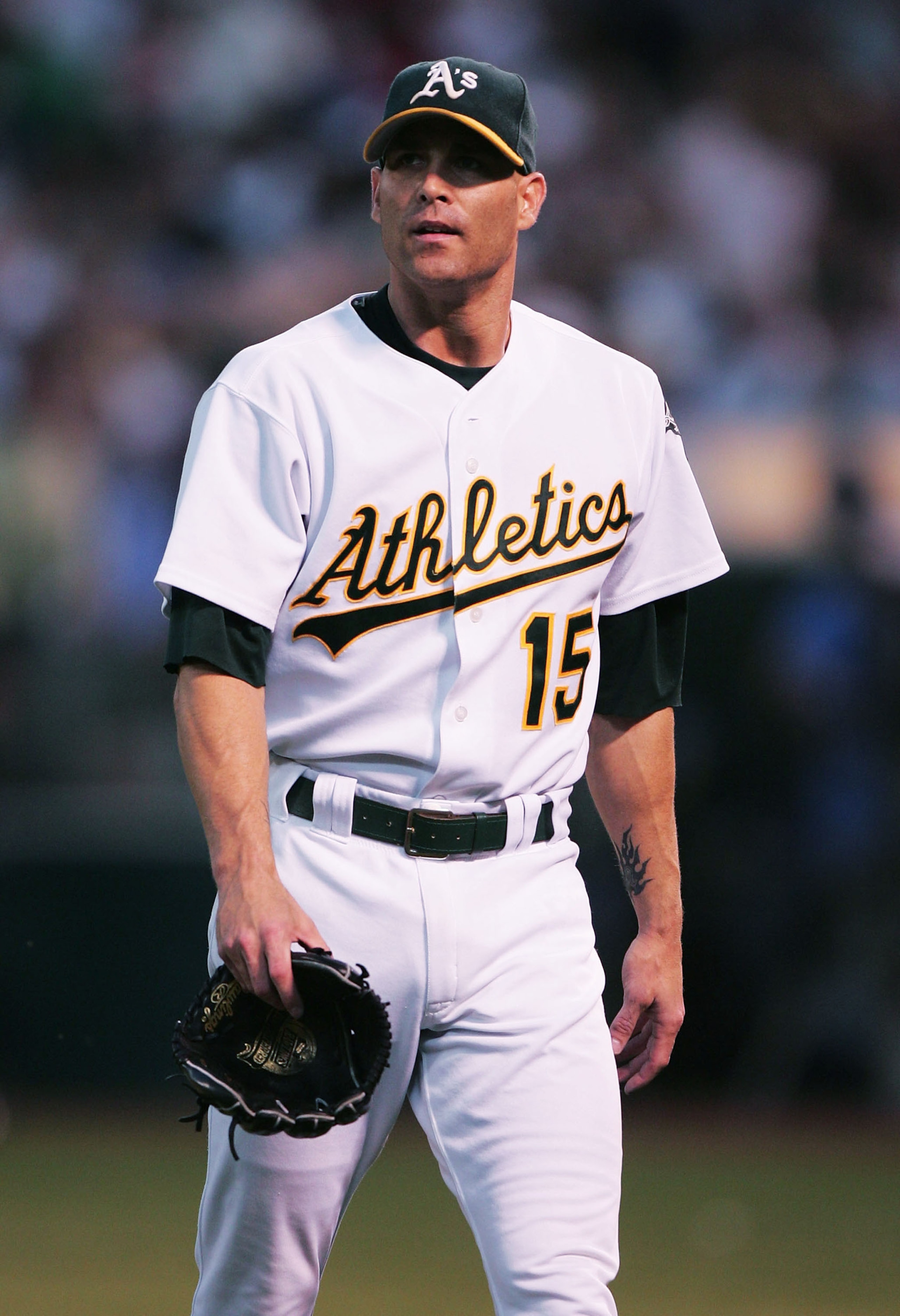OAKLAND, CA - SEPTEMBER 8:  Tim Hudson #15 of the Oakland Athletics walks off the mound after the first inning against the Boston Red Sox during a MLB game at the Network Associates Coliseum on September 8, 2004 in Oakland, California. (Photo by Jed Jacob