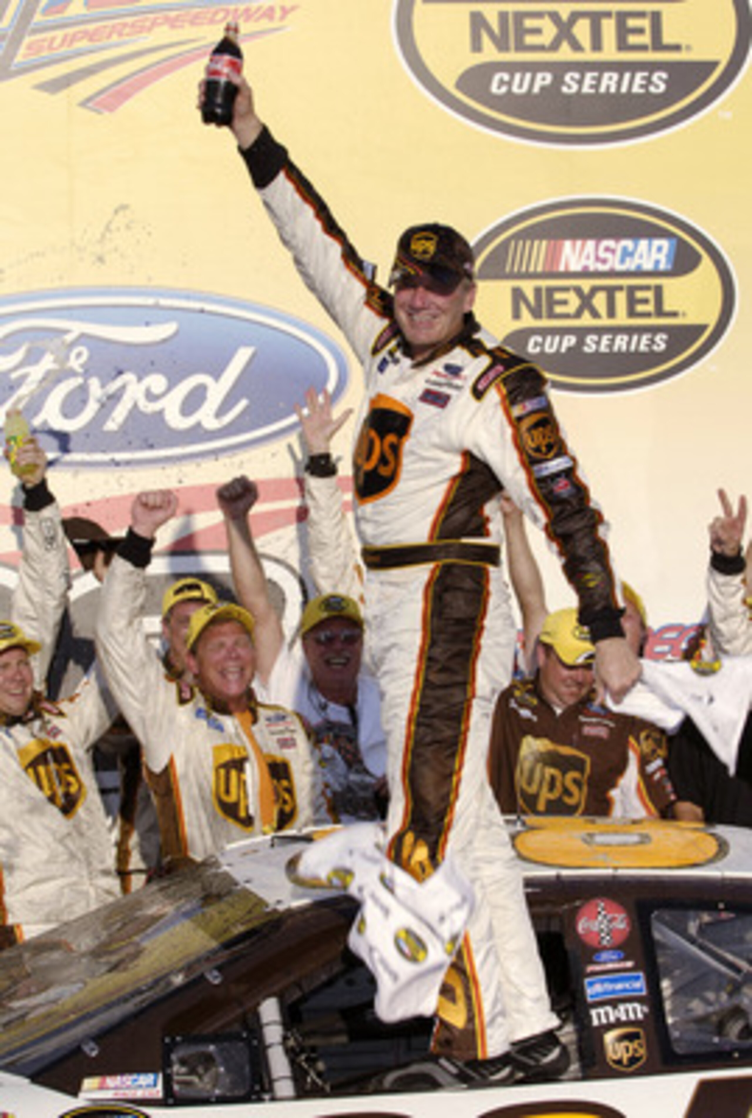 TALLADEGA, AL - OCTOBER 2:  Dale Jarrett, driver of the #88 UPS Ford, celebrates winning the NASCAR Nextel Cup Series UAW-Ford 500 on October 2, 2005 at the Talladega Superspeedway in Talladega, Alabama.  (Photo by Rusty Jarrett/Getty Images)