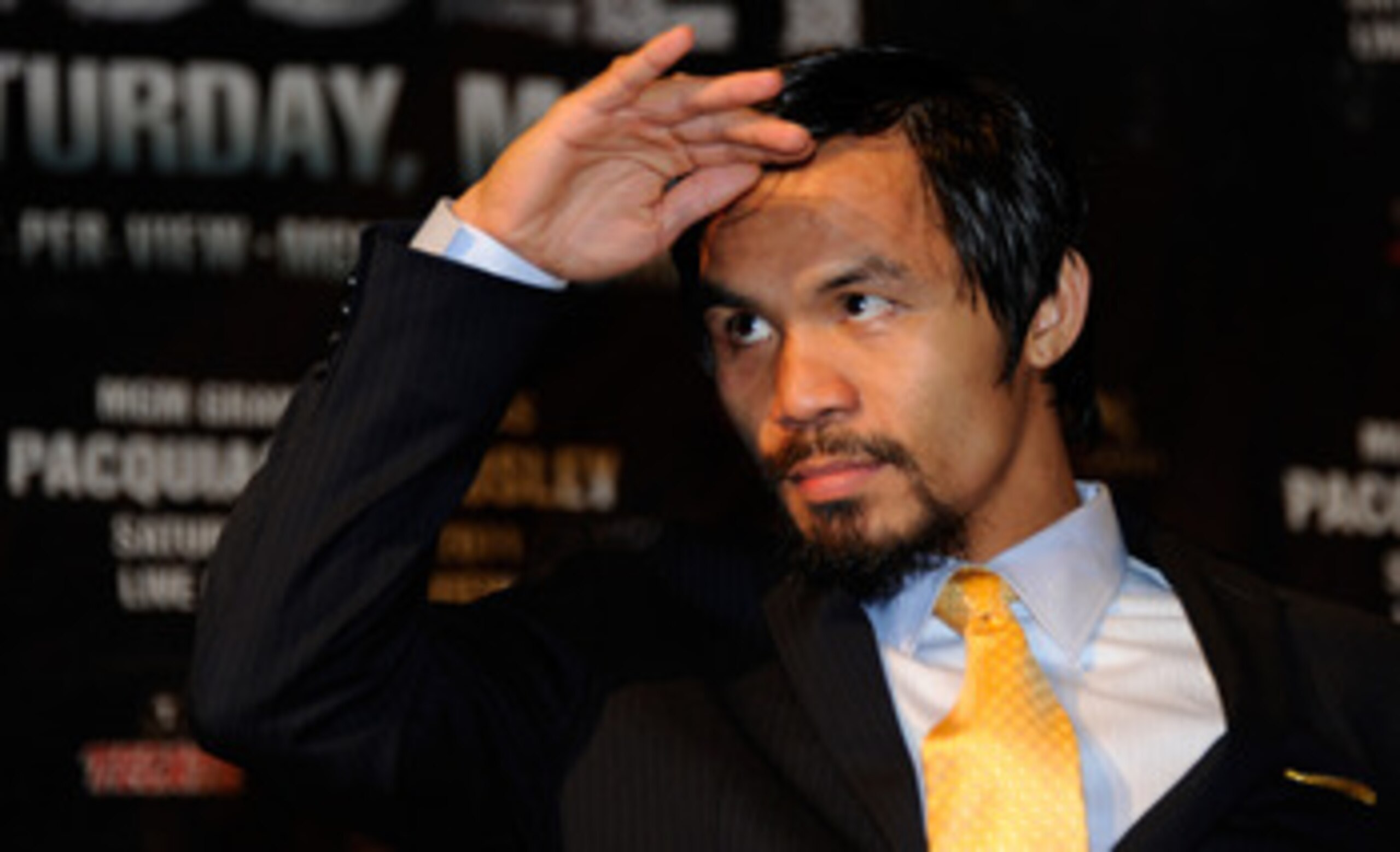 LAS VEGAS, NV - MAY 07:  Manny Pacquiao of the Philippines looks on during the post-fight news conference after Pacquiao defeated Shane Mosley by unanimous decision in the WBO welterweight title fight at MGM Grand Garden Arena on May 7, 2011 in Las Vegas,