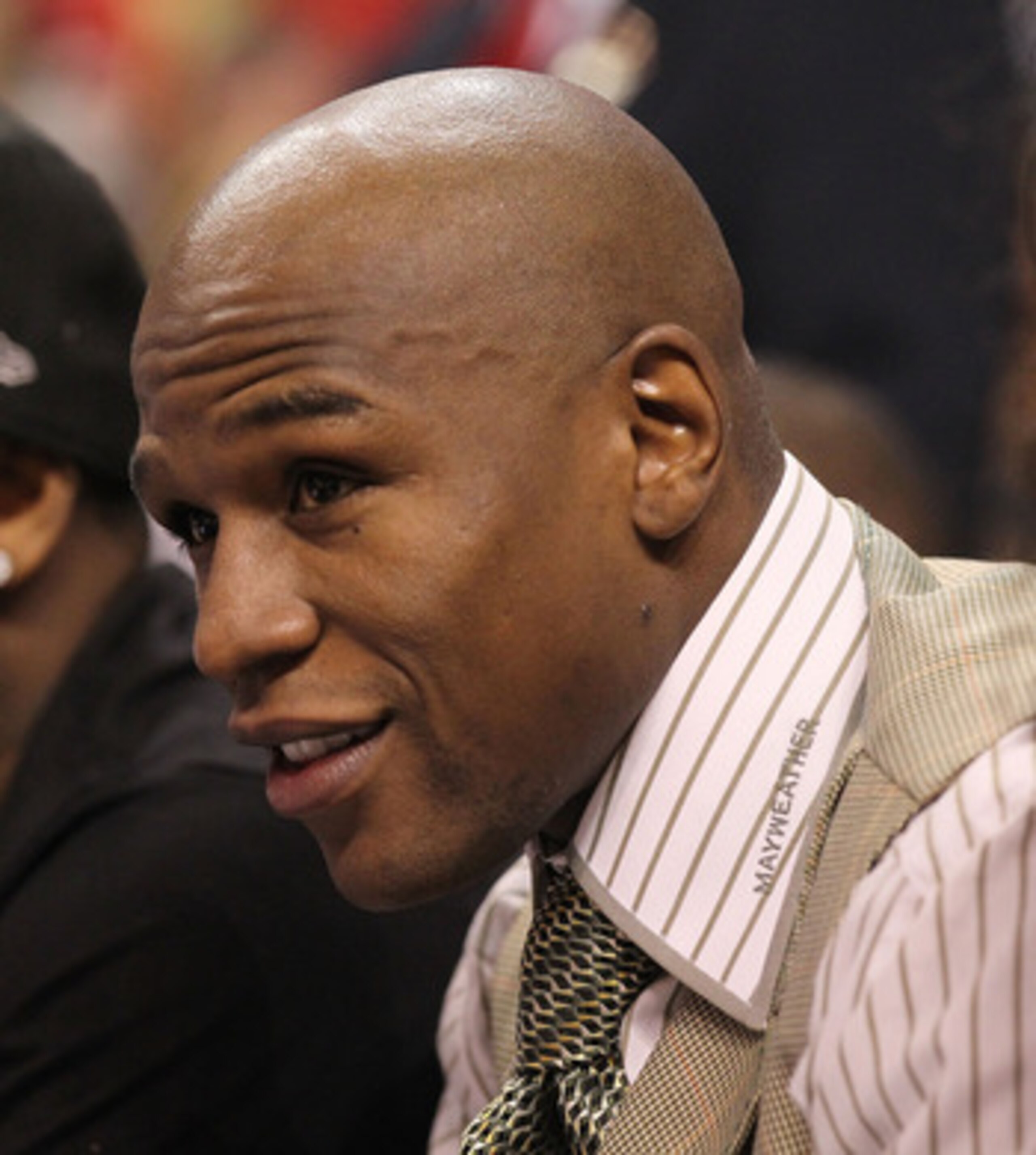 MIAMI, FL - DECEMBER 01: Boxer Floyd Mayweather Jr watches a game between the Miami Heat  and the Detroit Pistons at American Airlines Arena on December 1, 2010 in Miami, Florida. NOTE TO USER: User expressly acknowledges and agrees that, by downloading a