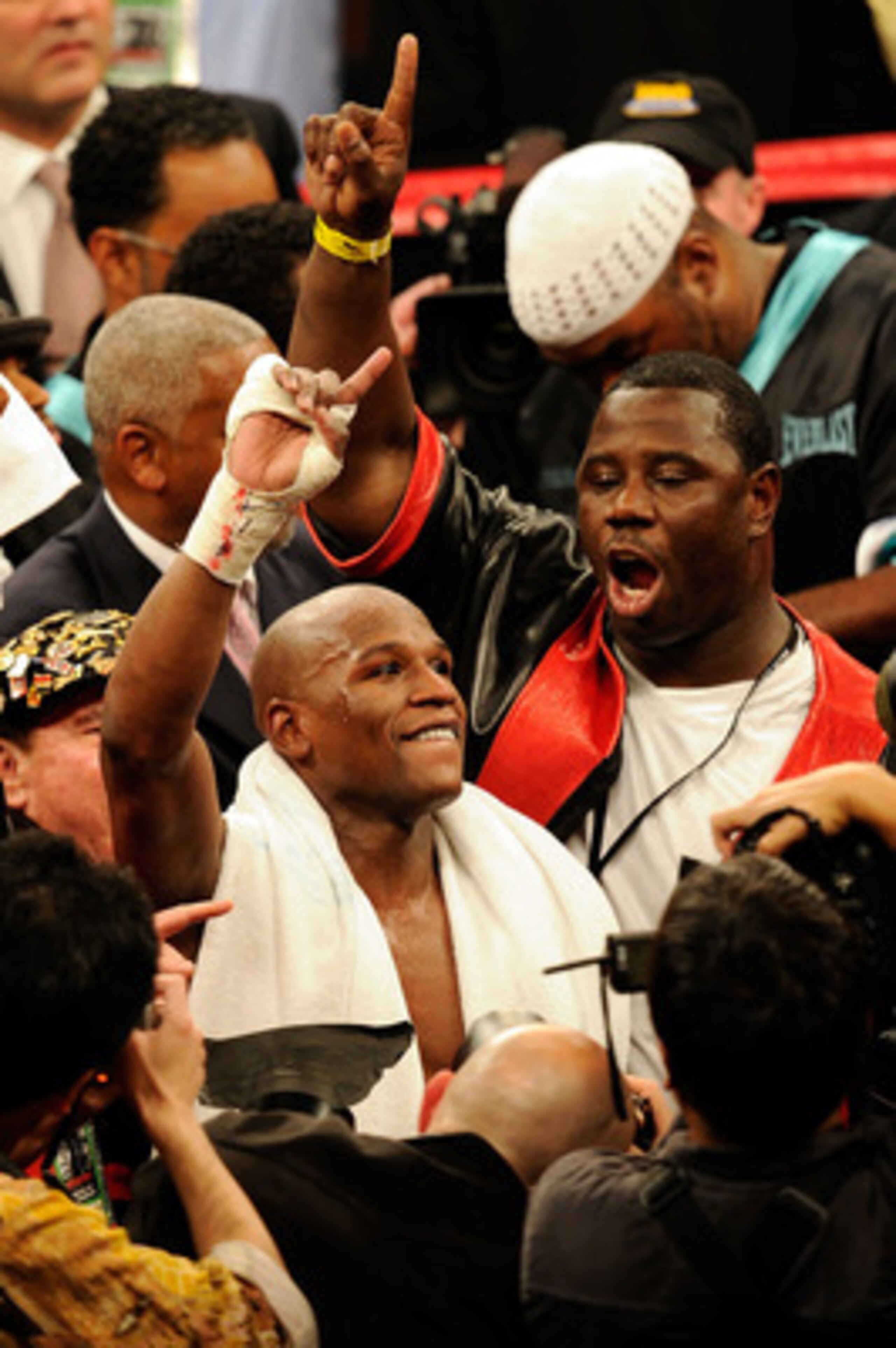 LAS VEGAS - MAY 01:  Floyd Mayweather Jr. reacts after defeating Shane Mosley by unanimous decision after the welterweight fight at the MGM Grand Garden Arena on May 1, 2010 in Las Vegas, Nevada.  (Photo by Ethan Miller/Getty Images)