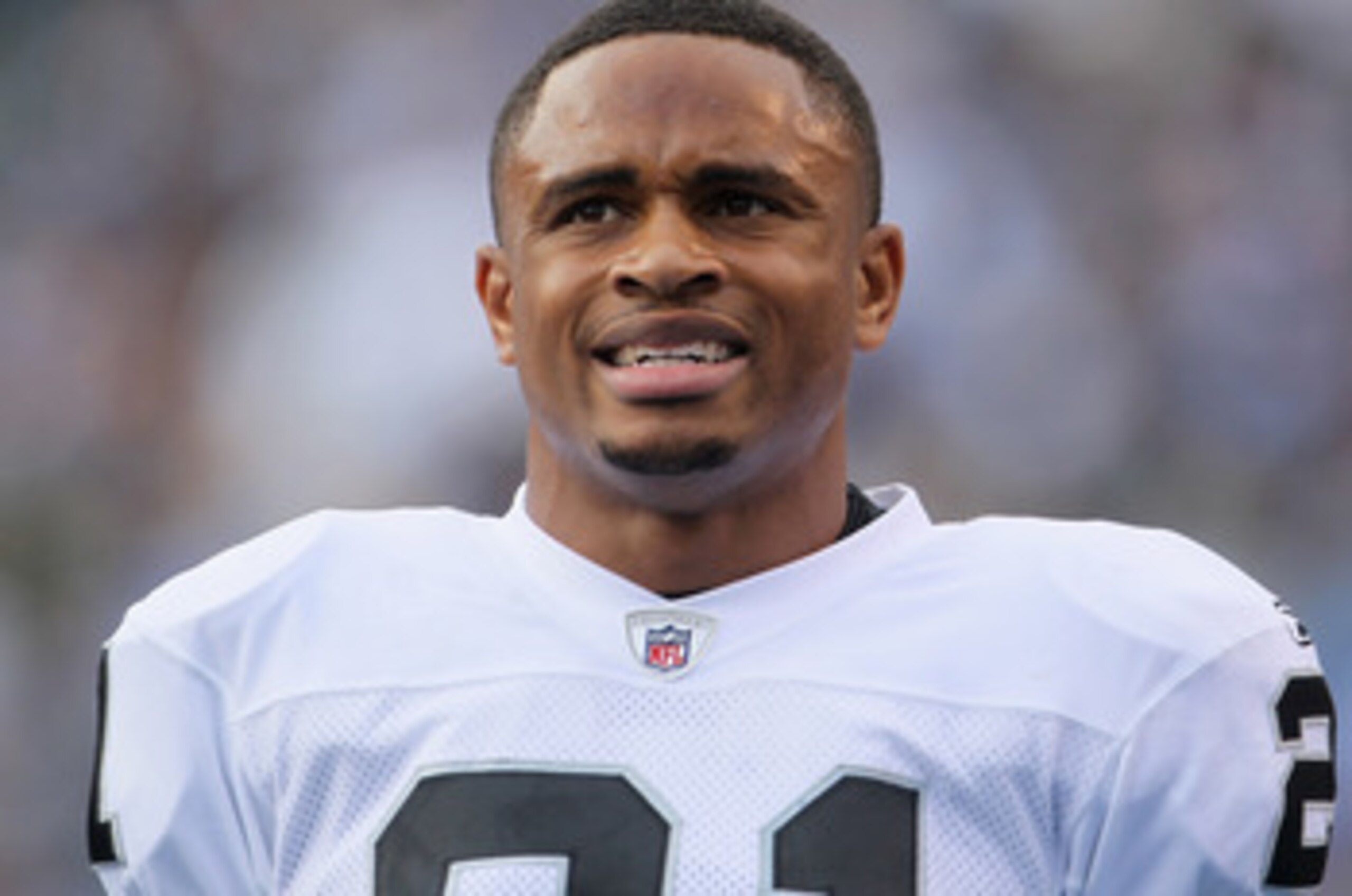 SAN DIEGO - DECEMBER 05:  Nnamdi Asomugha #21 the Oakland Raiders looks on from the sideline against the San Diego Chargers at Qualcomm Stadium on December 5, 2010 in San Diego, California. The Raiders defeated the Chargers 28-13.  (Photo by Jeff Gross/Ge