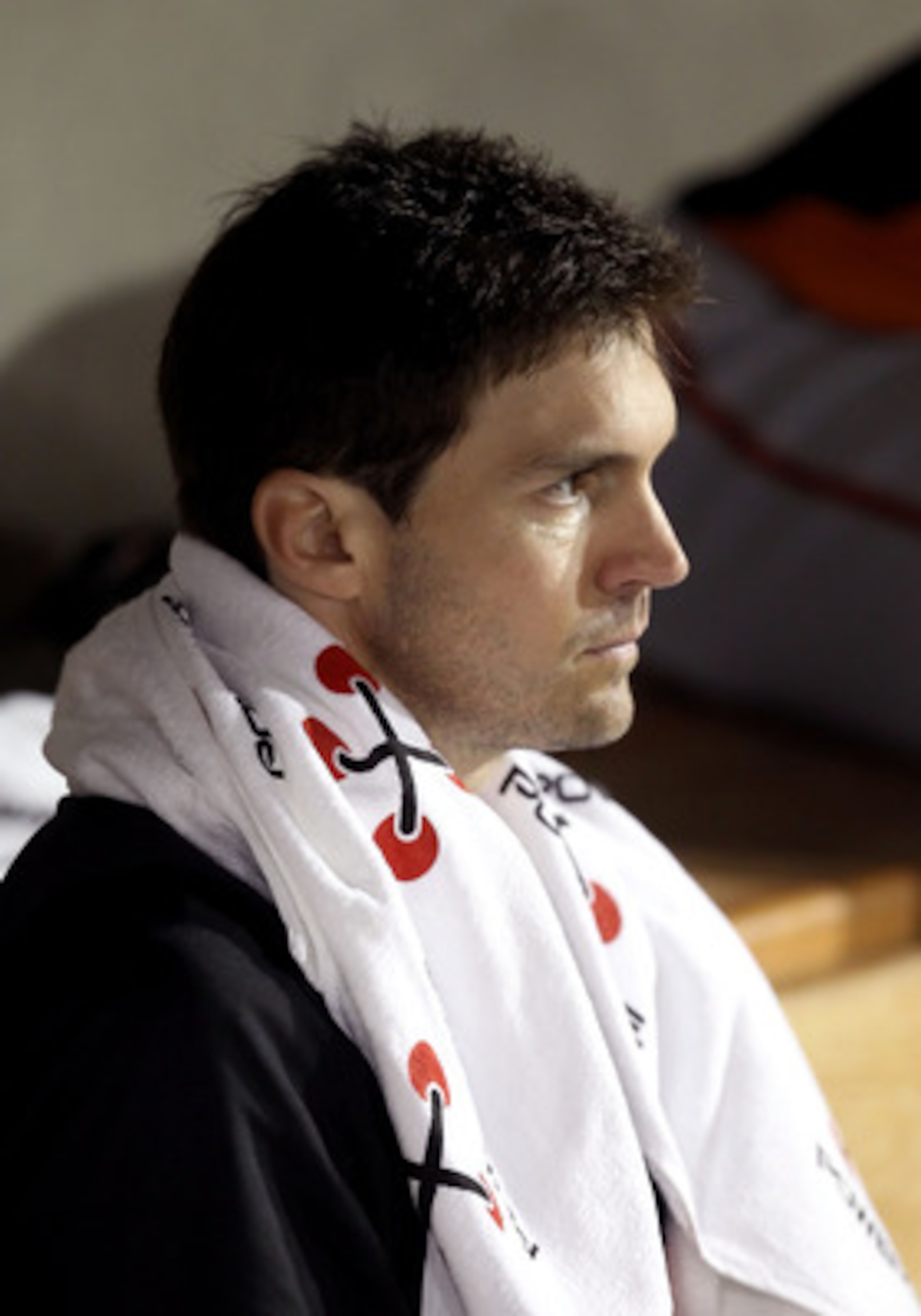 GLENDALE, AZ - MARCH 04:  Starting pitcher Barry Zito #75 of the San Francisco Giants sits in the dugout during the spring training game against the Los Angeles Dodgers at Camelback Ranch on March 4, 2011 in Glendale, Arizona.  (Photo by Christian Peterse
