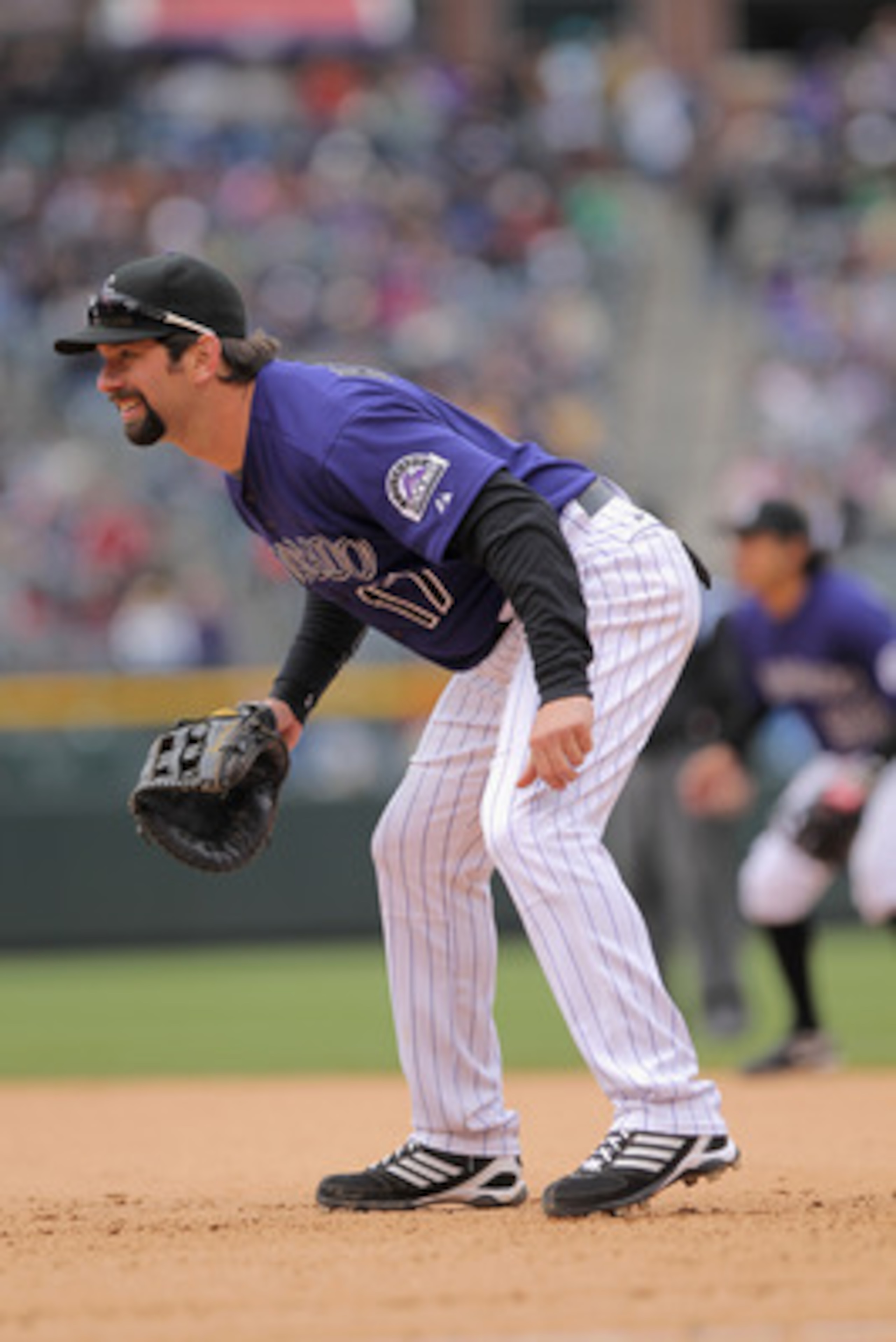 DENVER, CO - MAY 01:  First baseman Todd Helton #17 of the Colorado Rockies plays defense against the Pittsburgh Pirates at Coors Field on May 1, 2011 in Denver, Colorado. The Pirates defeated the Rockies 8-4.  (Photo by Doug Pensinger/Getty Images)