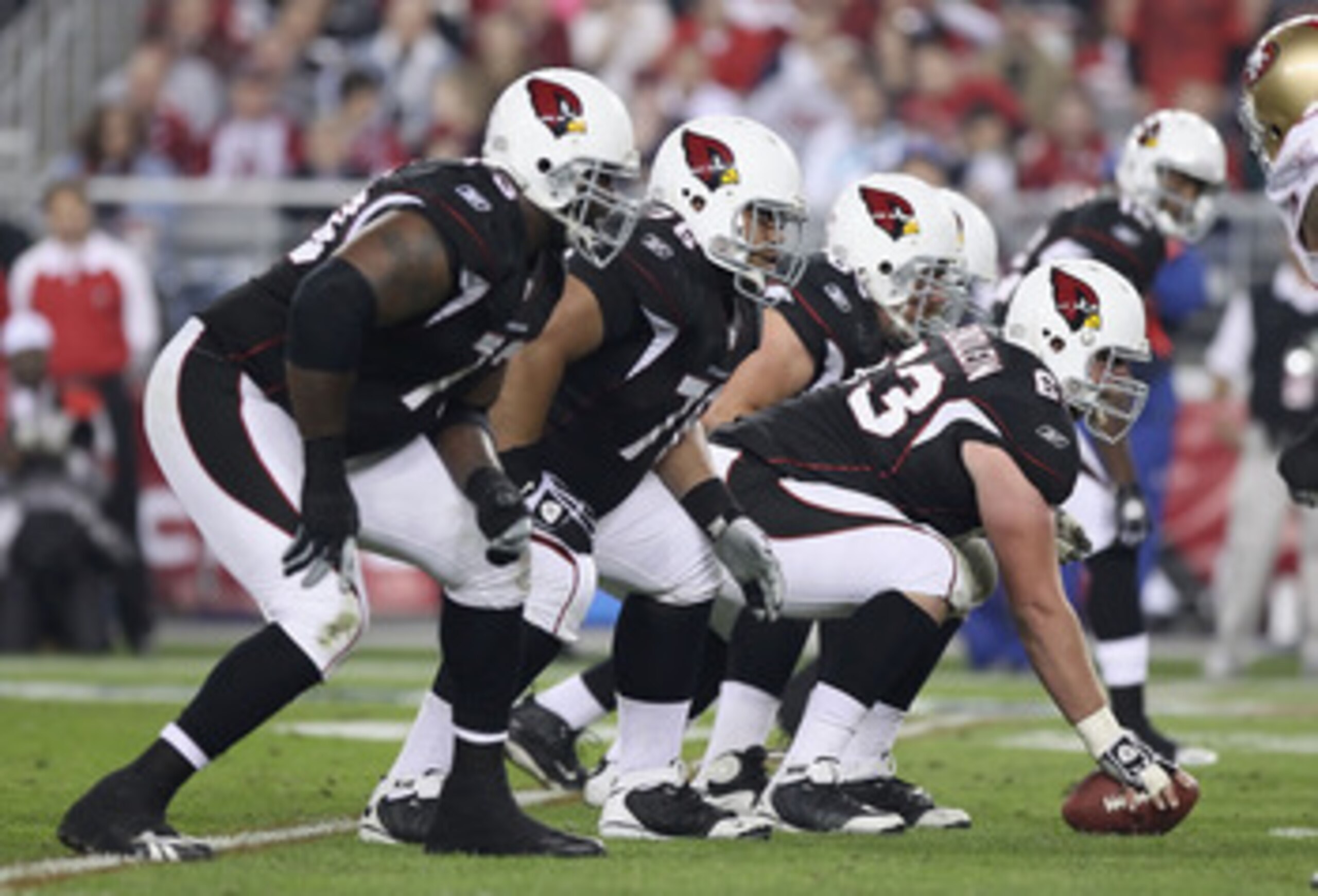 GLENDALE, AZ - NOVEMBER 29:   The Arizona Cardinals offensive line, centerd by Lyle Sendlein #63 line up during the NFL game against the San Francisco 49ers at the University of Phoenix Stadium on November 29, 2010 in Glendale, Arizona.  The 49ers defeate