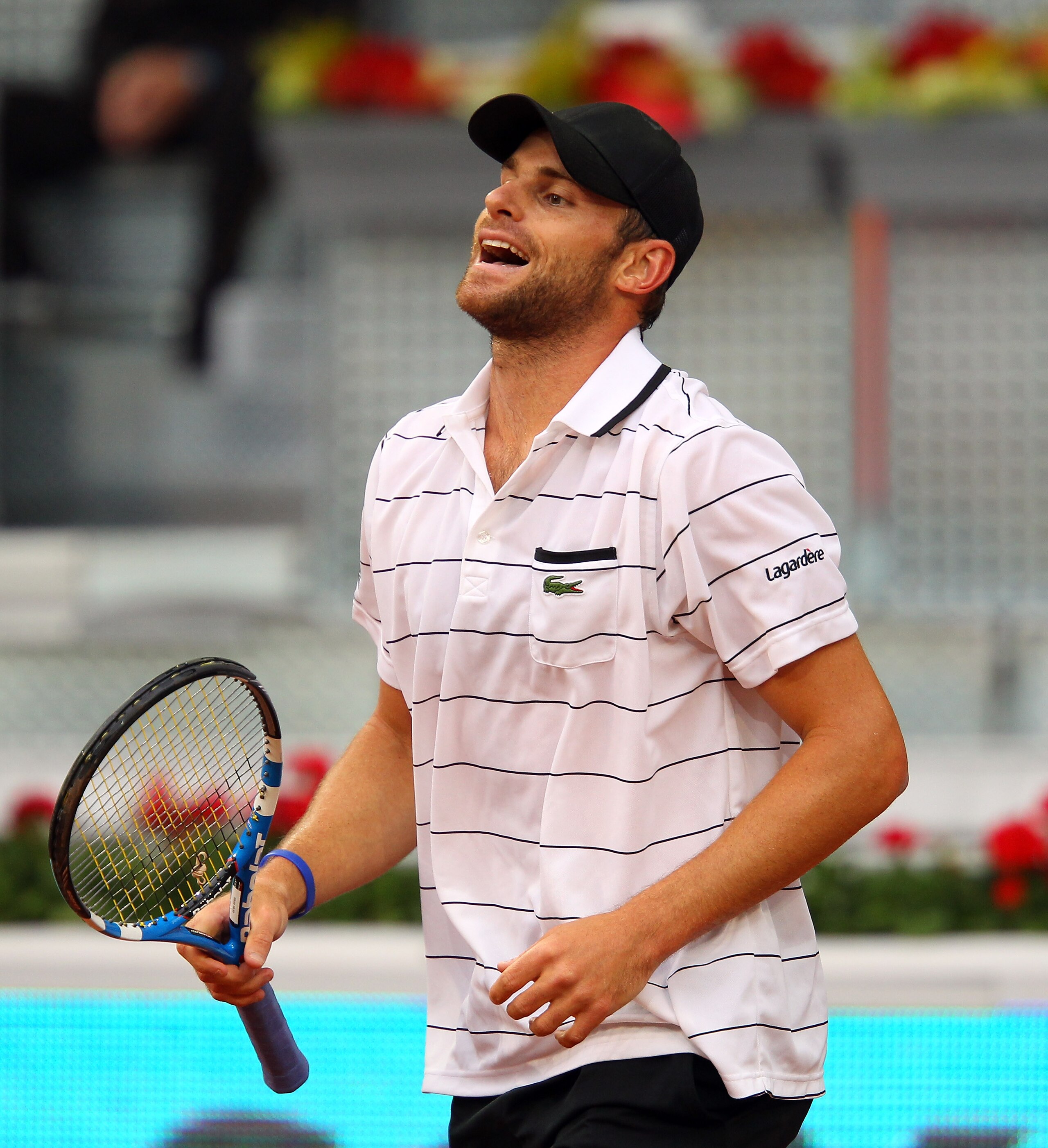 MADRID, SPAIN - MAY 02:  Andy Roddick of USA reacts in his match against Flavio Cipolla of Italy during day three of the Mutua Madrilena Madrid Open Tennis on May 2, 2011 in Madrid, Spain.  (Photo by Julian Finney/Getty Images)