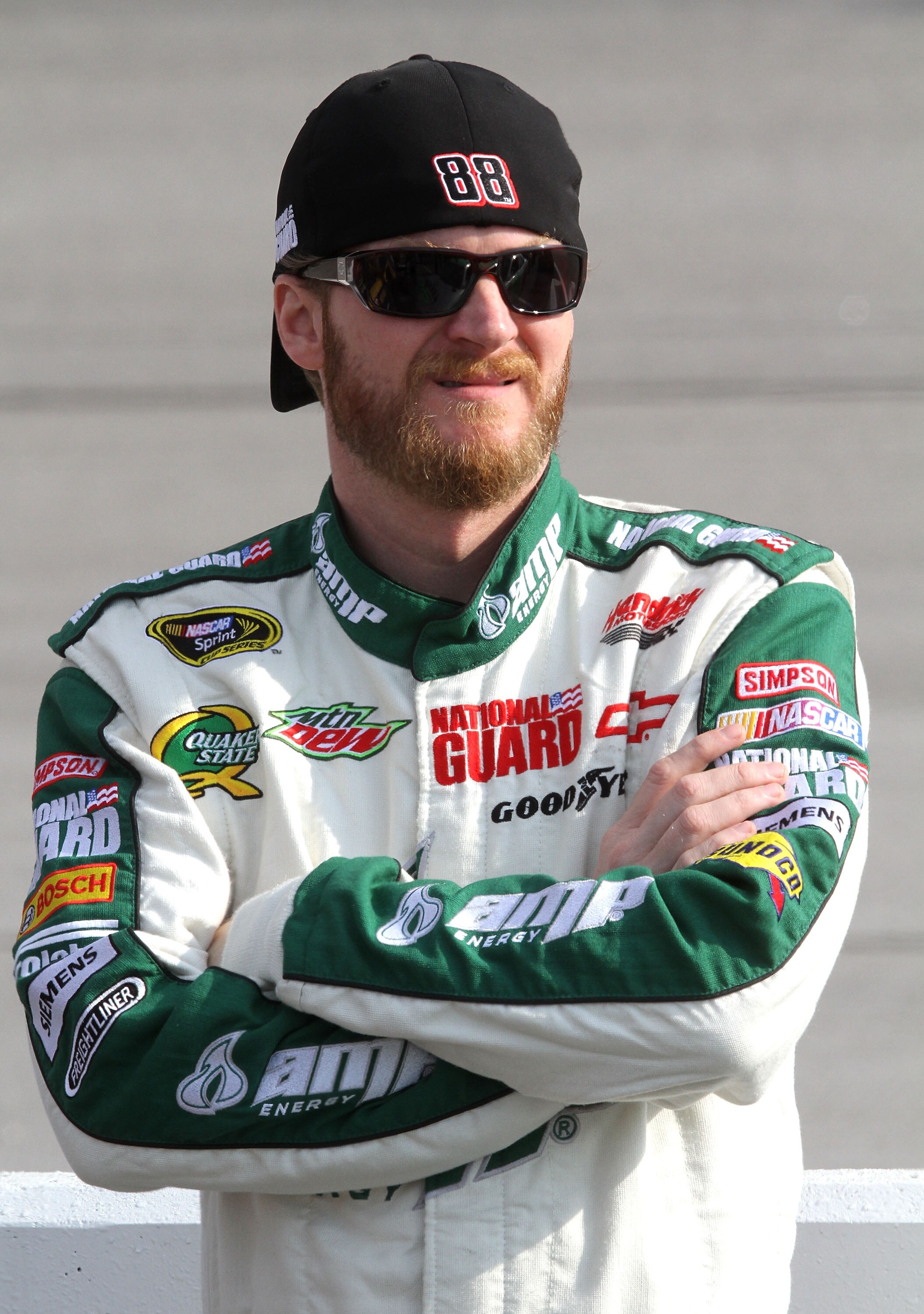 DARLINGTON, SC - MAY 06:  Dale Earnhardt Jr., driver of the #88 AMP Energy Sugar-Free / National Guard Chevrolet stands on pit road during qualifying for the NASCAR Sprint Cup Series SHOWTIME Southern 500 at Darlington Raceway on May 6, 2011 in Darlington