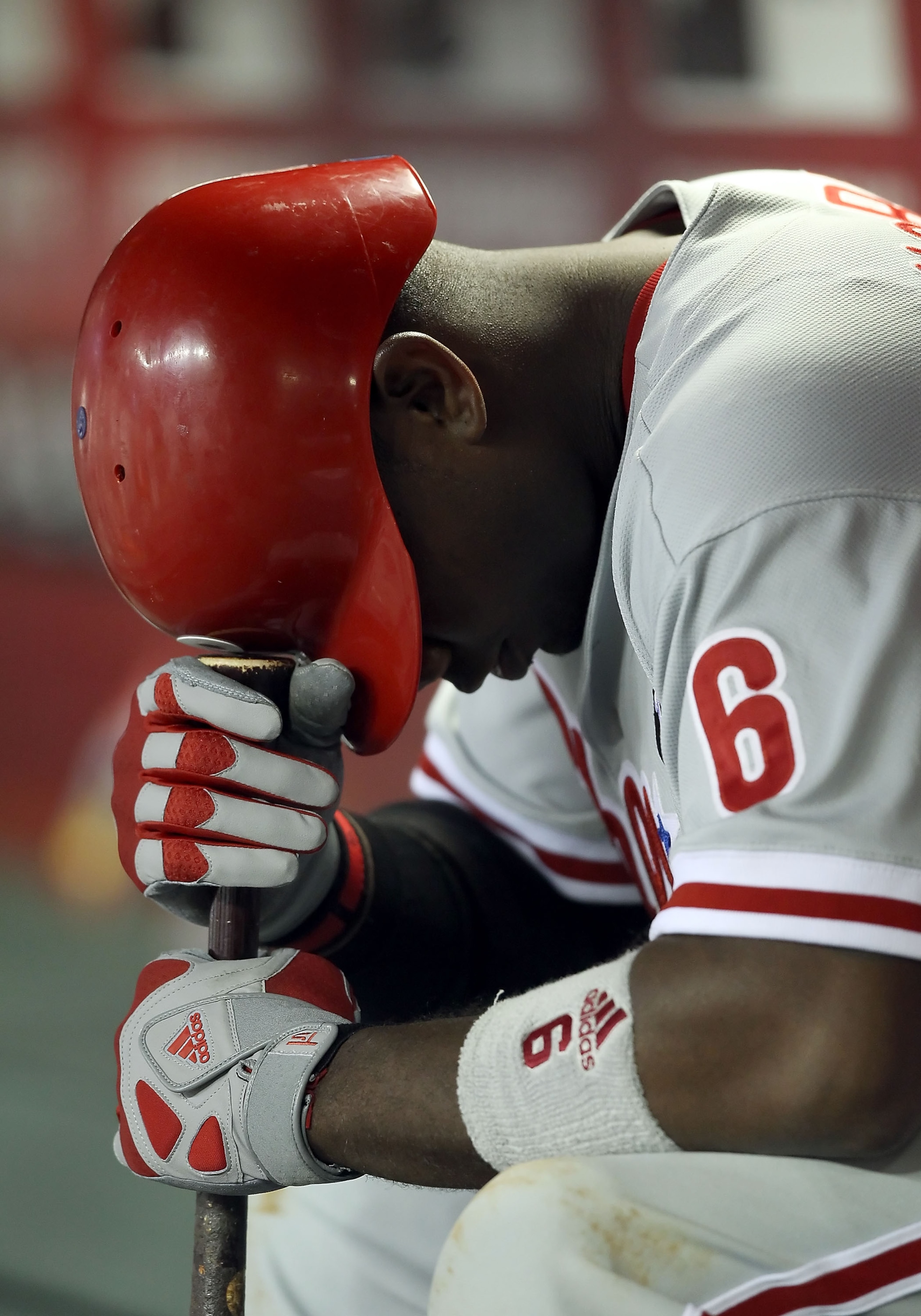PHOENIX, AZ - APRIL 26:  Ryan Howard #6 of the Philadelphia Phillies sits in the dugout during the Major League Baseball game against the Arizona Diamondbacks at Chase Field on April 26, 2011 in Phoenix, Arizona. The Diamondbacks defeated the Phillies 7-5