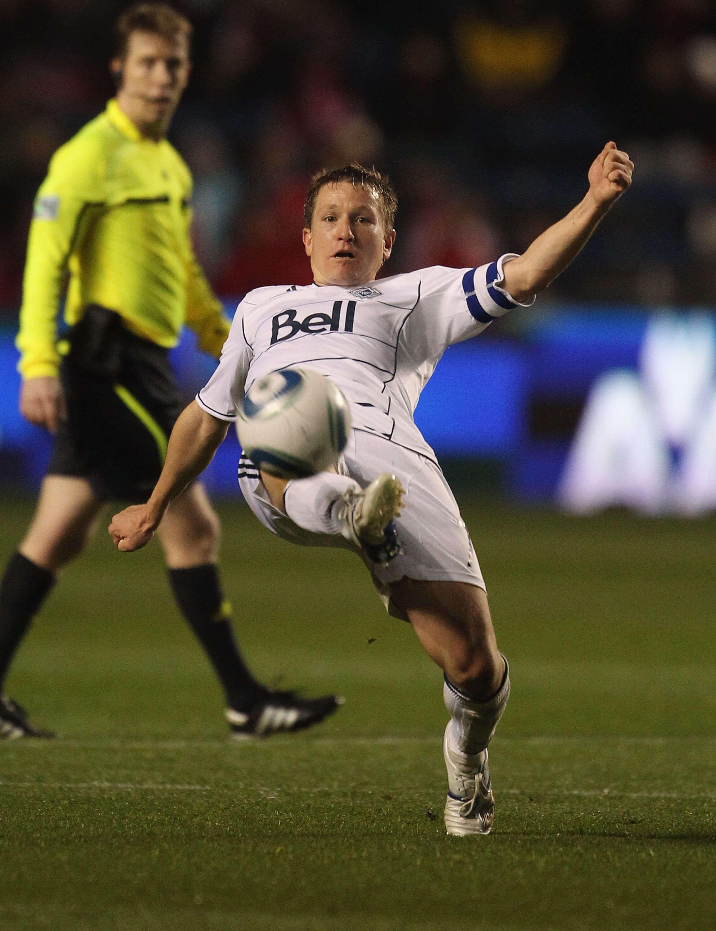 BRIDGEVIEW, IL - MAY 07: Terry Dunfield #7 of the Vancouver Whitecaps FC passes the ball against the Chicago Fire during an MLS match at Toyota Park on May 7, 2011 in Bridgeview, Illinois. The Fire and the Whitecaps tied 0-0. (Photo by Jonathan Daniel/Get