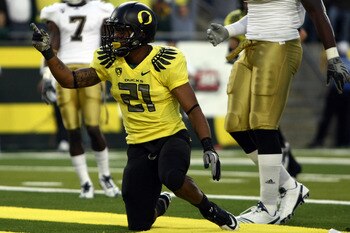 EUGENE, OR - OCTOBER 21:  LaMichael James #21 of the Oregon Ducks ceelebrates scoring a touchdown in the 1st quarter against the UCLA Bruins on October 21, 2010 at the Autzen Stadium in Eugene, Oregon.  (Photo by Jonathan Ferrey/Getty Images)