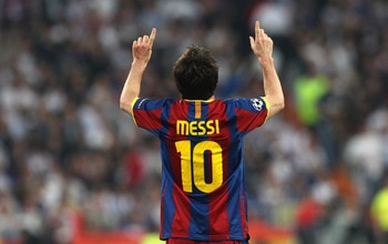 MADRID, SPAIN - APRIL 27:  Lionel Messi of Barcelona celebrates after scoring his second goal during the UEFA Champions League Semi Final first leg match between Real Madrid and Barcelona at Estadio Santiago Bernabeu on April 27, 2011 in Madrid, Spain.  (