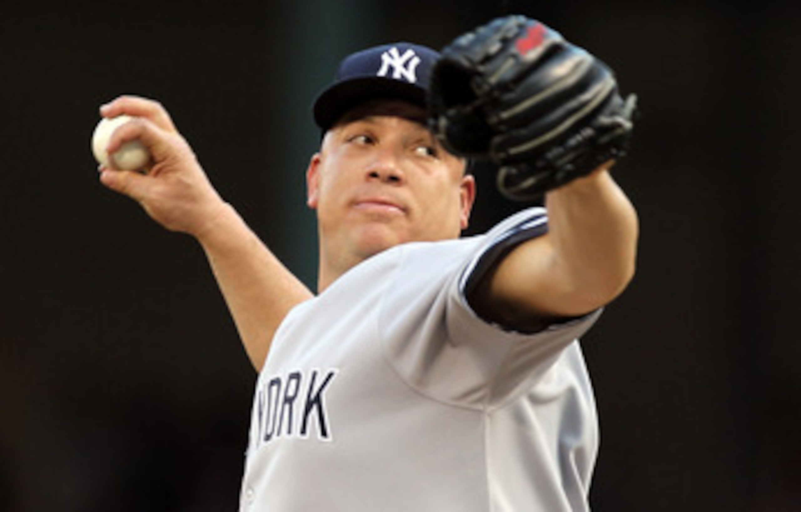 ARLINGTON, TX - MAY 07:  Pitcher Bartolo Colon #40 of the New York Yankees throws against the Texas Rangers in the first inning at Rangers Ballpark in Arlington on May 7, 2011 in Arlington, Texas.  (Photo by Ronald Martinez/Getty Images)