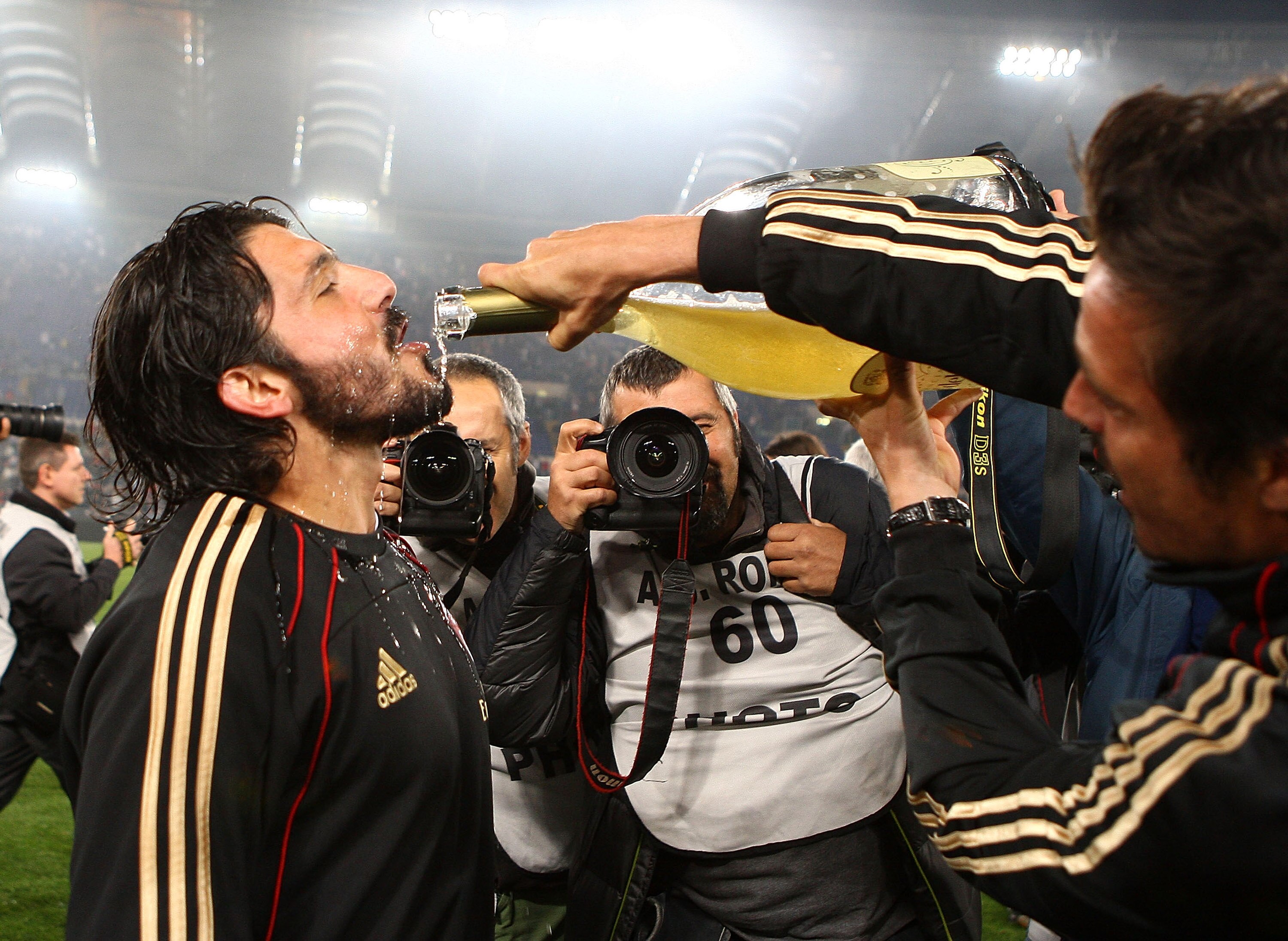 ROME, ITALY - MAY 07:  Gennaro Gattuso of AC Milan celebrates after claiming the Serie A title following victory in the Serie A match between AS Roma and AC Milan at Stadio Olimpico on May 7, 2011 in Rome, Italy.  (Photo by Paolo Bruno/Getty Images)