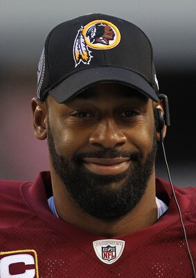 ARLINGTON, TX - DECEMBER 19:  Quarterback Donovan McNabb #5  of the Washington Redskins on the sidelines against play against the Dallas Cowboys at Cowboys Stadium on December 19, 2010 in Arlington, Texas.  (Photo by Ronald Martinez/Getty Images)