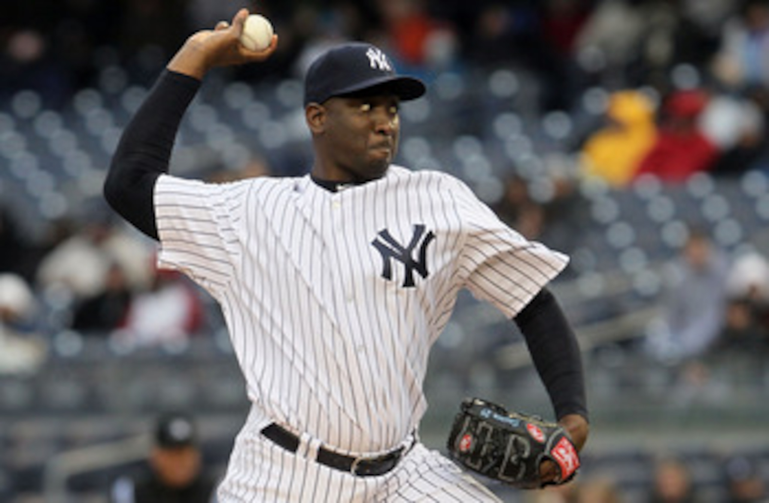 NEW YORK, NY - APRIL 16:  Rafael Soriano #29 of the New York Yankees pitches during the eighth inning against the Texas Rangers on April 16, 2011 at Yankee Stadium in the Bronx borough of New York City. The Yankees defeated the Rangers 5-2.  (Photo by Jim
