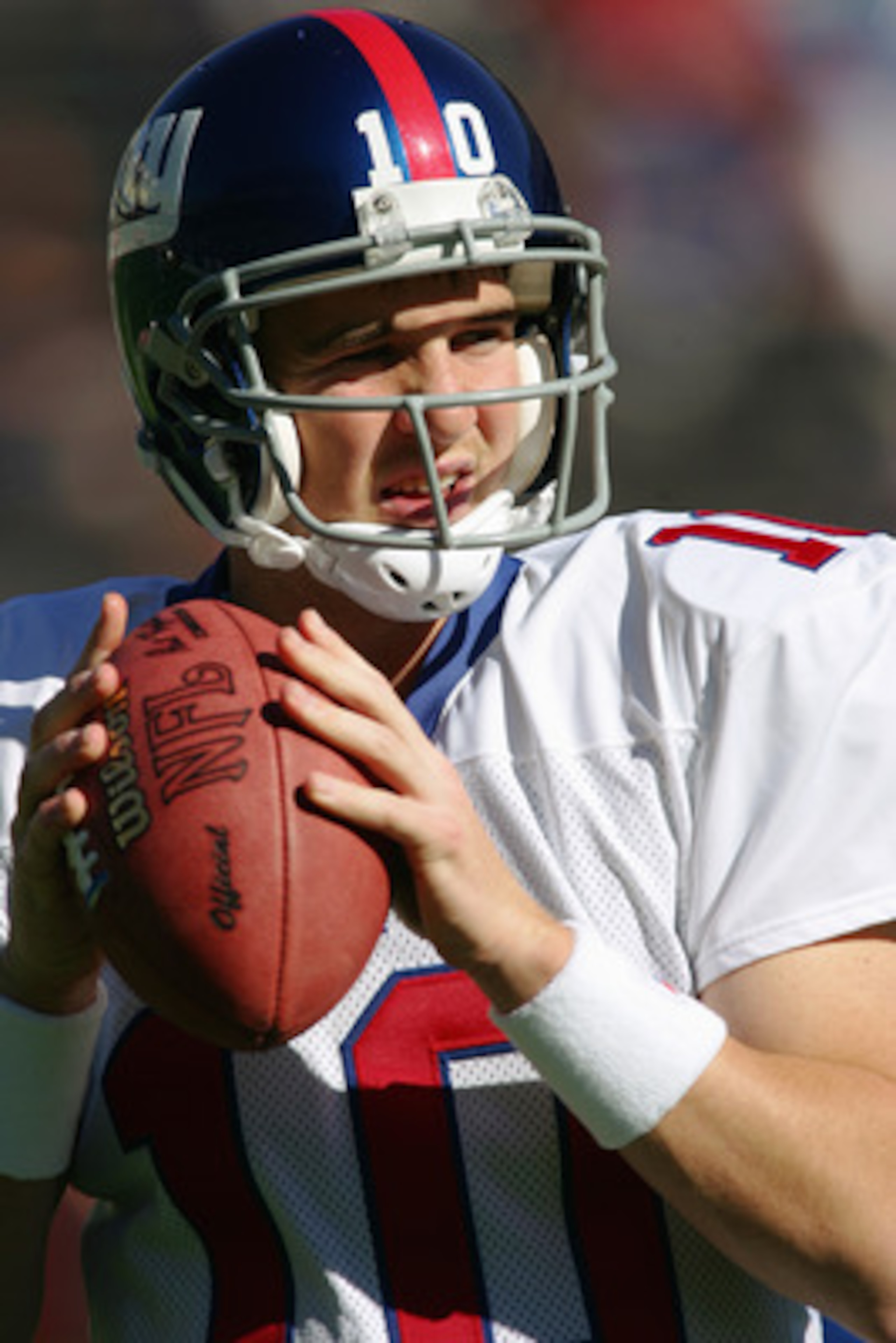 TEMPE, AZ - NOVEMBER 14:  Eli Manning #10 of the New York Giants passes before the NFL game against the Arizona Cardinals at Sun Devil Stadium/Frank Kush Field on November 14, 2004 in Tempe, Arizona.  The Cardinals defeated the Giants 17-14.  (Photo by Do