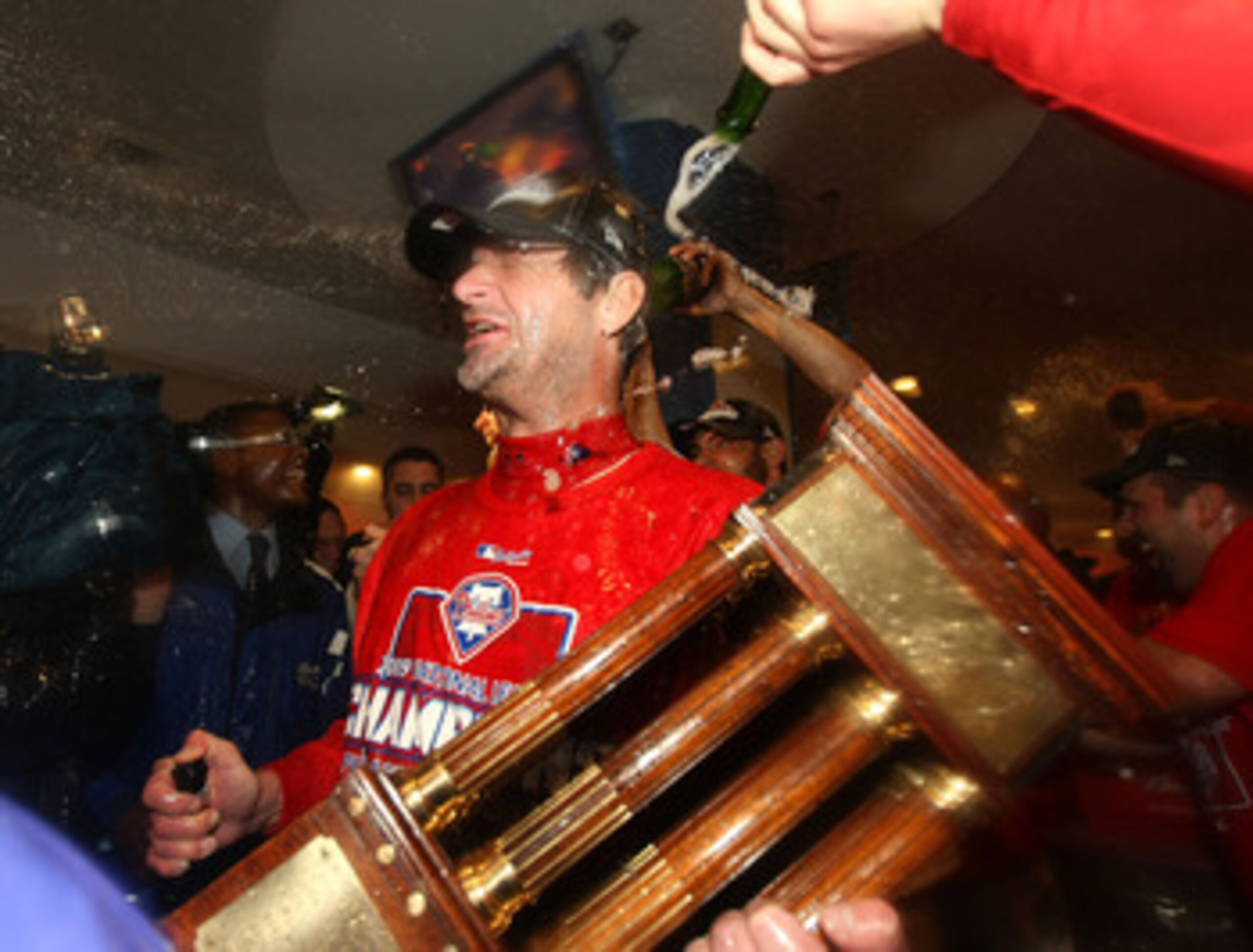 PHILADELPHIA - OCTOBER 21:  Jamie Moyer of the Philadelphia Phillies celebrates with champagne defeating the Los Angeles Dodgers 10-4 to advance to the World Series in Game Five of the NLCS during the 2009 MLB Playoffs at Citizens Bank Park on October 21,