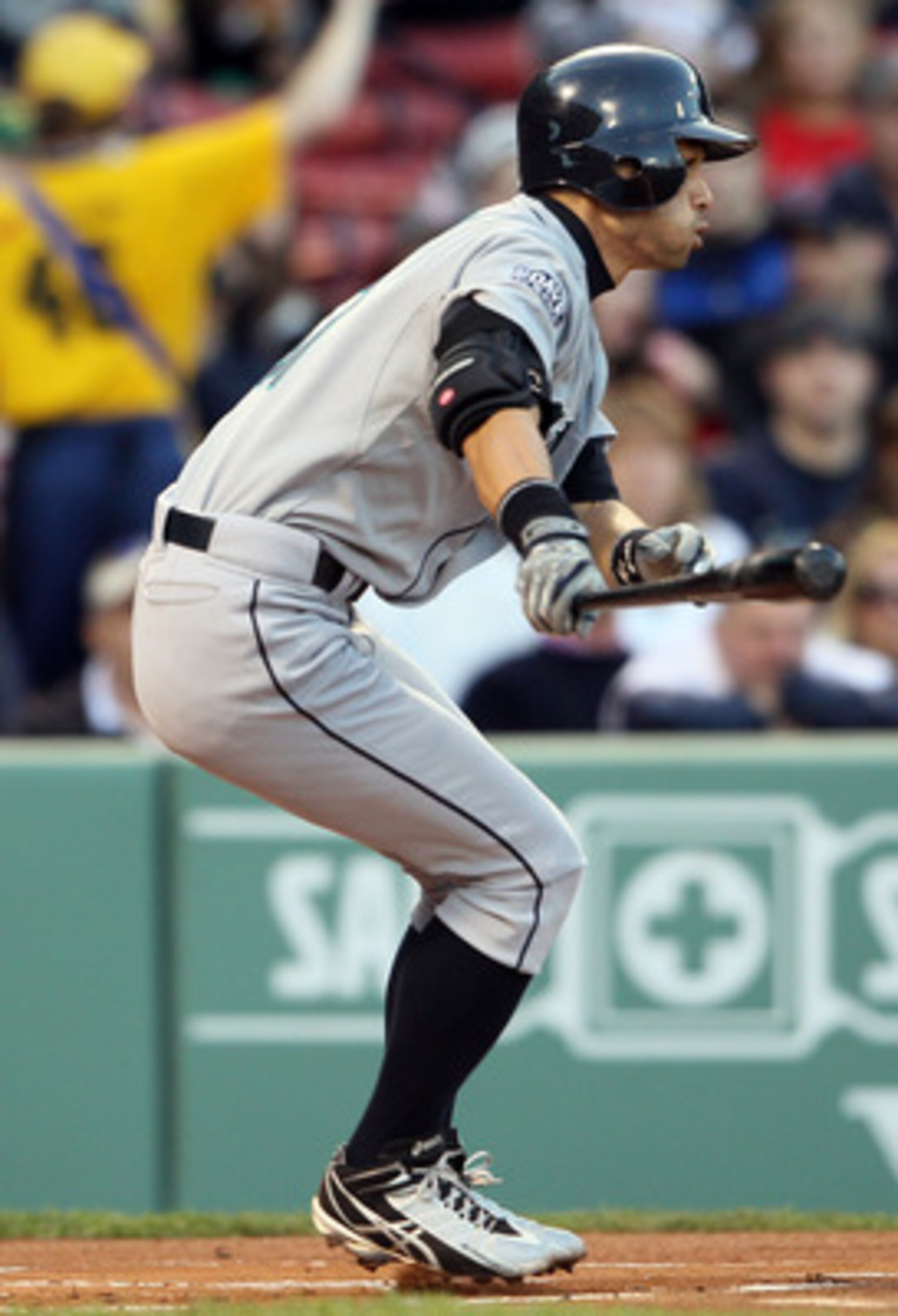 BOSTON, MA - APRIL 30:  Ichiro Suzuki #51 of the Seattle Mariners hits a single in the first inning against the Boston Red Sox on April 30, 2011 at Fenway Park in Boston, Massachusetts.  (Photo by Elsa/Getty Images)