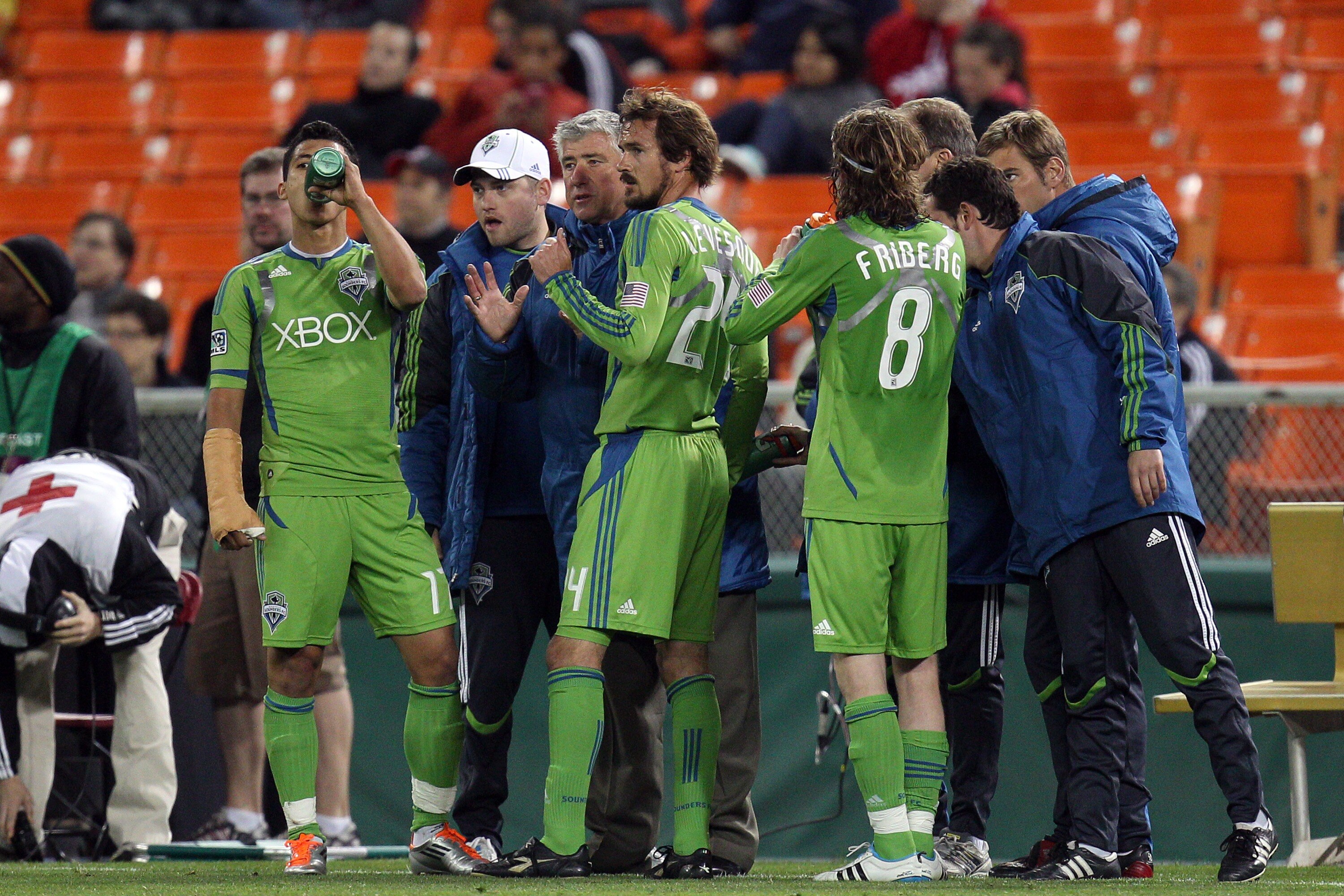 WASHINGTON, DC - MAY 4: Head coach Sigi Schmid of the Seattle Sounders speaks with players against D.C. United at RFK Stadium on May 4, 2011 in Washington, DC. (Photo by Ned Dishman/Getty Images)