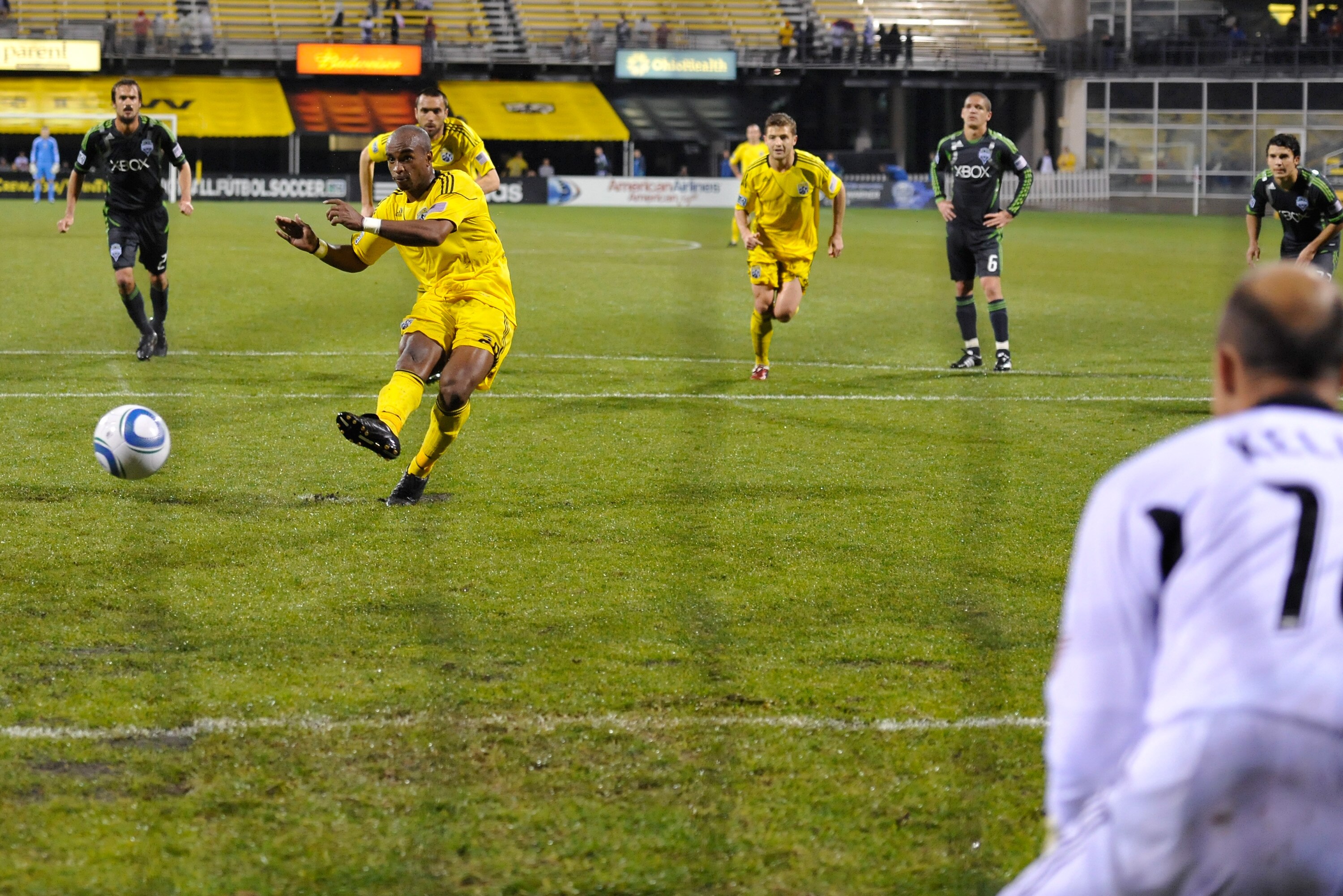 COLUMBUS, OH - MAY 7:  Emilio Renteria #20 of the Columbus Crew gets goalkeeper Kasey Keller #18 of the Seattle Sounders to go the wrong direction on a successful penalty kick in the second half on May 7, 2011 at Crew Stadium in Columbus, Ohio. Columbus a