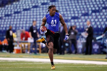INDIANAPOLIS, IN - MARCH 1: Defensive back Robert Sands #41 of West Virginia runs with the football during the 2011 NFL Scouting Combine at Lucas Oil Stadium on February 28, 2011 in Indianapolis, Indiana. (Photo by Joe Robbins/Getty Images) INDIANAPOLIS, IN - MARCH 1: Defensive back Robert Sands #41 of West Virginia runs with the football during the 2011 NFL Scouting Combine at Lucas Oil Stadium on February 28, 2011 in Indianapolis, Indiana. (Photo by Joe Robbins/Getty Images)