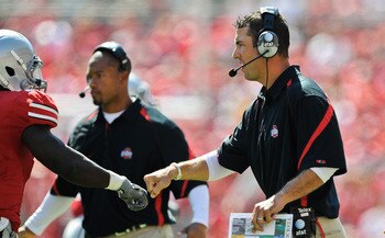 COLUMBUS, OH - SEPTEMBER 18:  Assistant Coach Luke Fickell of the Ohio State Buckeyes fists pump one of his players during a game against the Ohio Bobcats at Ohio Stadium on September 18, 2010 in Columbus, Ohio.  (Photo by Jamie Sabau/Getty Images)