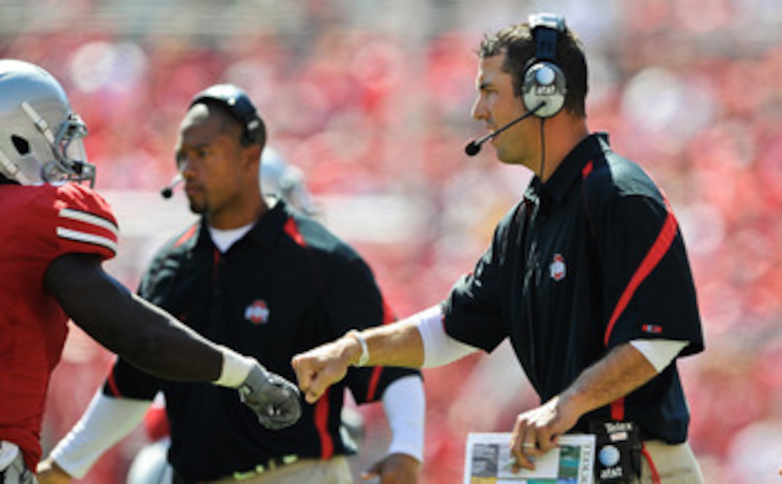 COLUMBUS, OH - SEPTEMBER 18:  Assistant Coach Luke Fickell of the Ohio State Buckeyes fists pump one of his players during a game against the Ohio Bobcats at Ohio Stadium on September 18, 2010 in Columbus, Ohio.  (Photo by Jamie Sabau/Getty Images)