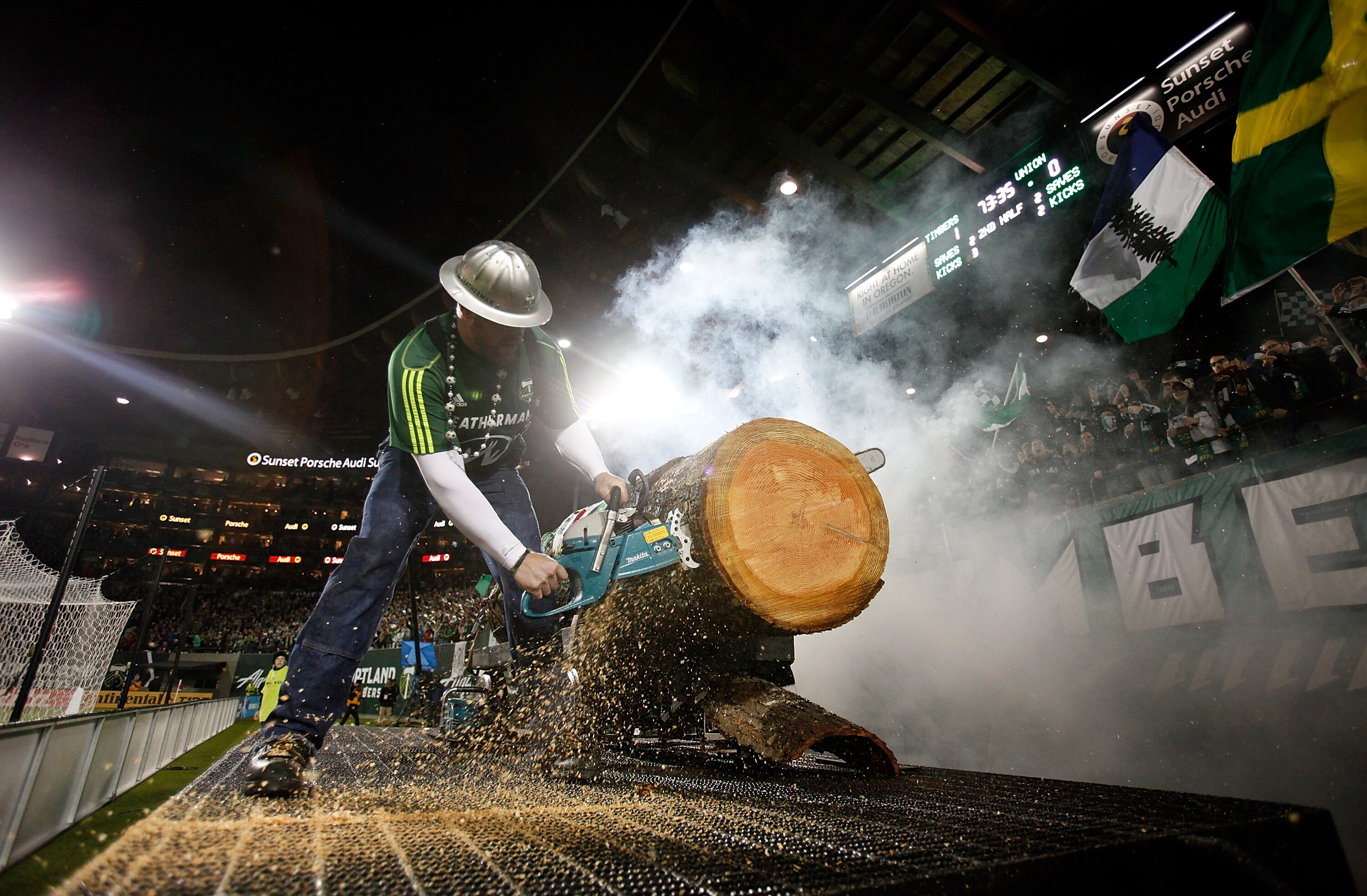 PORTLAND, OR - MAY 06:  Mascot Timber Joey cuts a section of the log after the Portland Timbers score a gola in the second half against  the Portland Timbers of the Philadelphia Union  on May 6, 2011 at Jeld-Wen Field in Portland, Oregon.  (Photo by Jonat