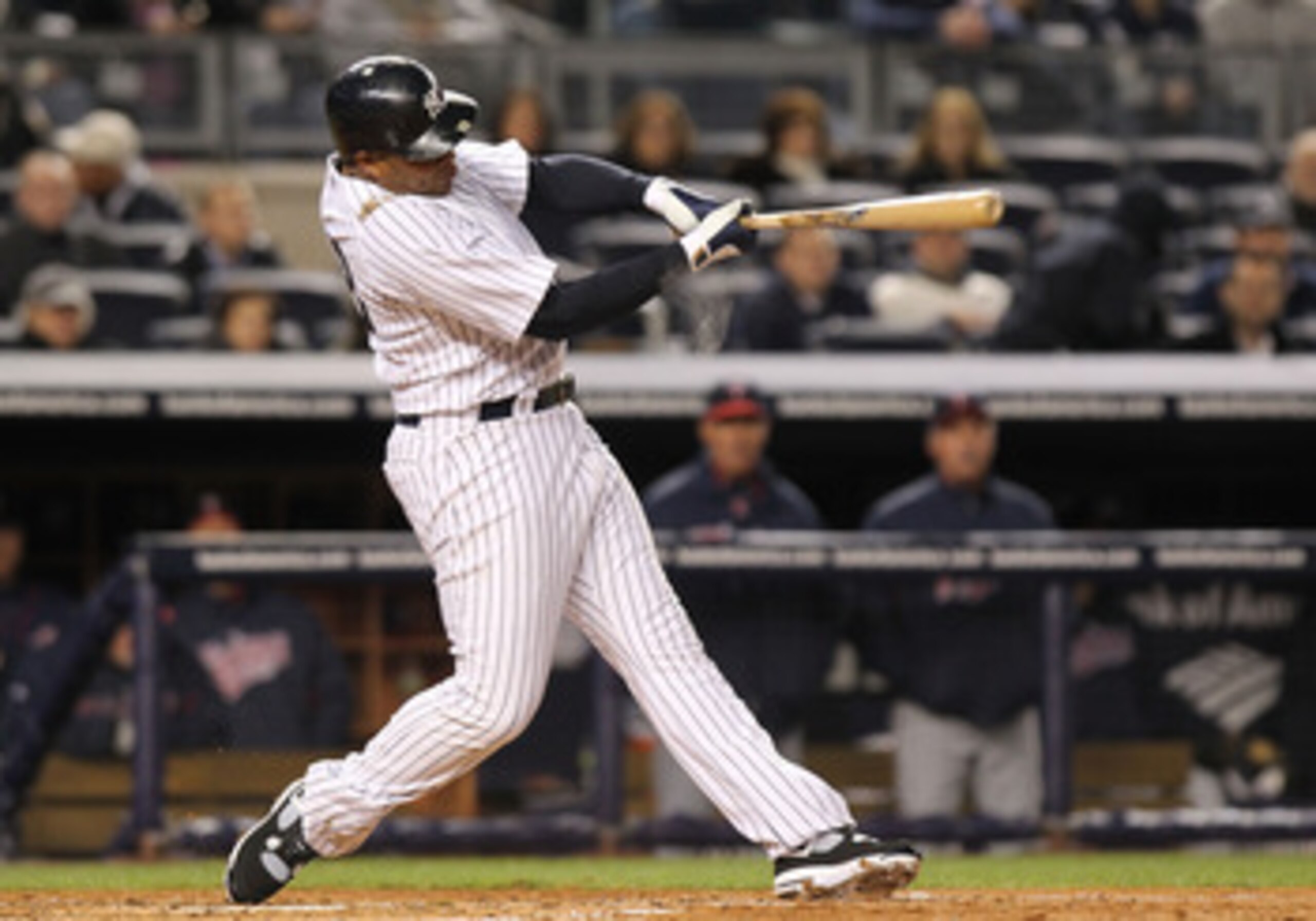 NEW YORK, NY - APRIL 05:  Andruw Jones #18 of the New York Yankees hits a solo homerun against the Minnesota Twins at Yankee Stadium on April 5, 2011 in the Bronx borough of New York City.  (Photo by Nick Laham/Getty Images)