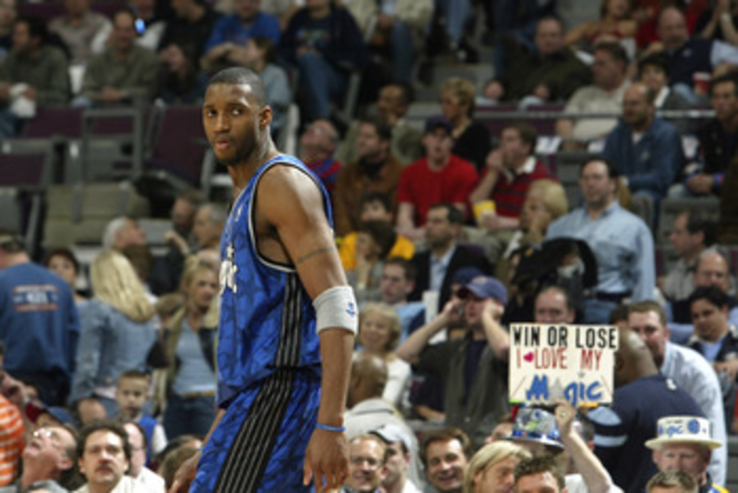 AUBURN HILLS, MI - APRIL 23:  Tracy McGrady #1 of the Orlando Magic looks back as he walks to the bench during play against the Detroit Pistons in Game two of the Eastern Conference Quarterfinals during the 2003 NBA Playoffs at The Palace of Auburn Hills 