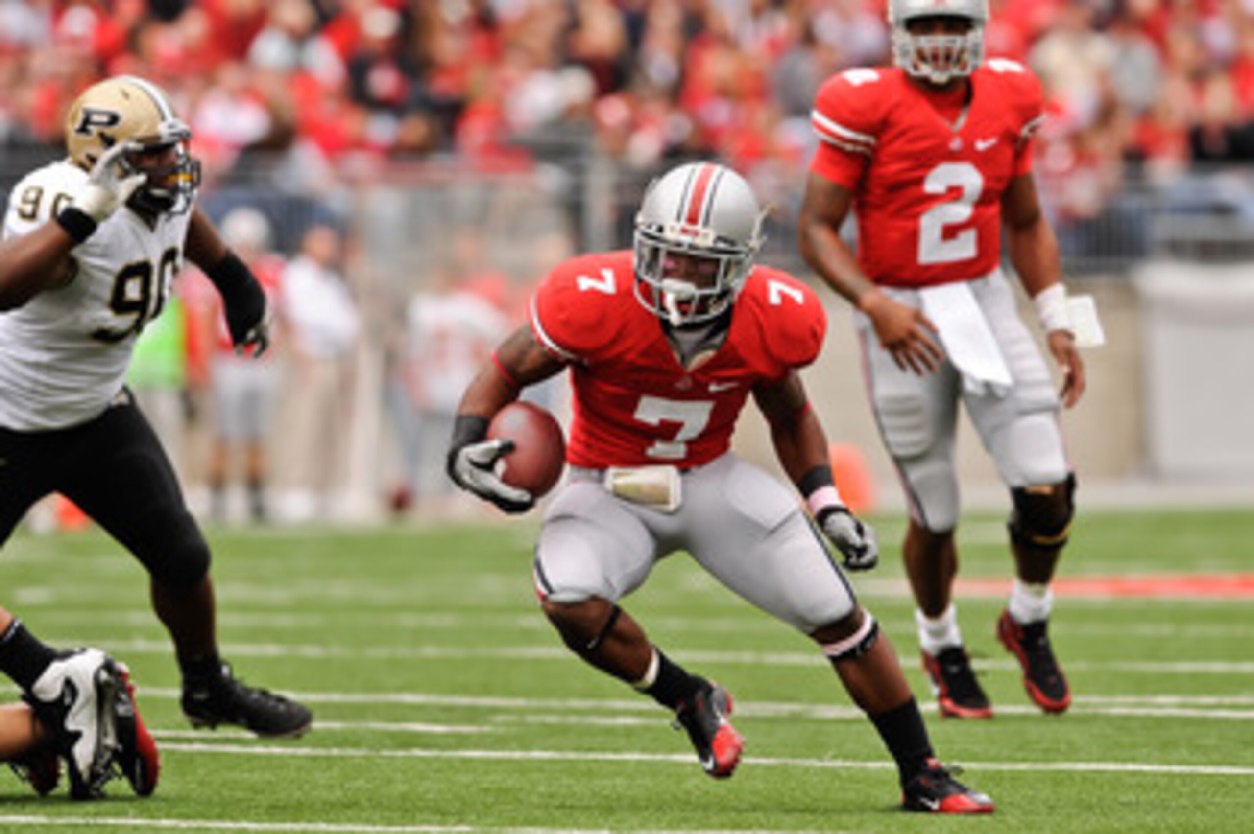 COLUMBUS, OH - OCTOBER 23:  Jordan Hall #7 of the Ohio State Buckeyes runs with the ball against the Purdue Boilermakers at Ohio Stadium on October 23, 2010 in Columbus, Ohio.  (Photo by Jamie Sabau/Getty Images)