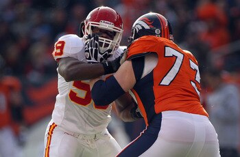 DENVER - NOVEMBER 14:  Offensive lineman Chris Kuper #73 of the Denver Broncos blocks against Jovan Belcher #59 of the Kansas City Chiefs at INVESCO Field at Mile High on November 14, 2010 in Denver, Colorado. The Broncos defeated the Chiefs 49-29.  (Phot