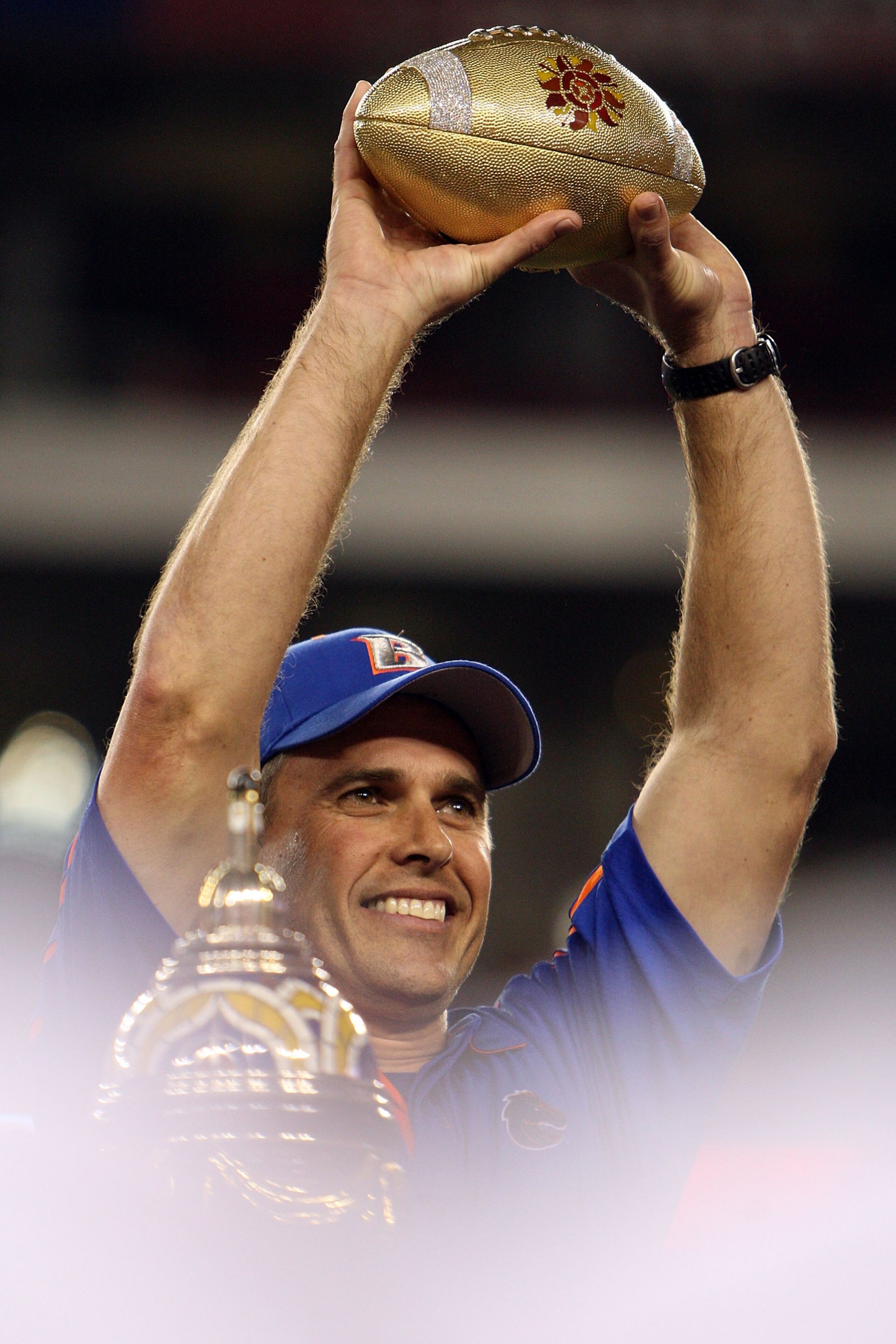 GLENDALE, AZ - JANUARY 04:  Head coach Chris Petersen of the Boise State Broncos celebrates after defeating the TCU Horned Frogs 17-10 during the Tostitos Fiesta Bowl at the Universtity of Phoenix Stadium on January 4, 2010 in Glendale, Arizona.  (Photo b