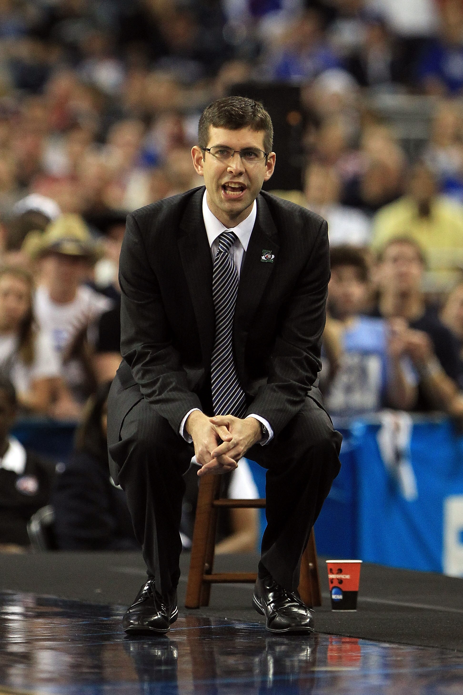HOUSTON, TX - APRIL 04:  Head coach Brad Stevens of the Butler Bulldogs looks on from the sidelines against the Connecticut Huskies during the National Championship Game of the 2011 NCAA Division I Men's Basketball Tournament at Reliant Stadium on April 4