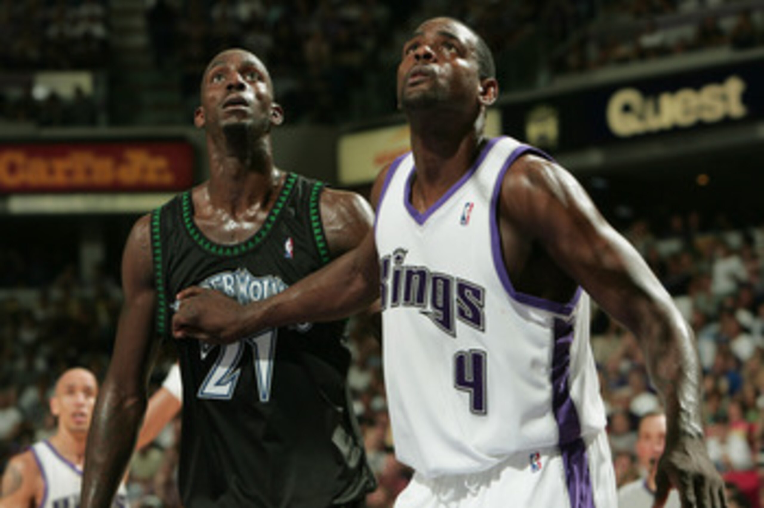 SACRAMENTO, CA - MAY 16:  Chris Webber #4 of the Sacramento Kings and Kevin Garnett #21 of Minnesota Timberwolves attempt to rebound in Game six of the Western Conference Semifinals during the 2004 NBA Playoffs at Arco Arena on May 16, 2004 in Sacramento,